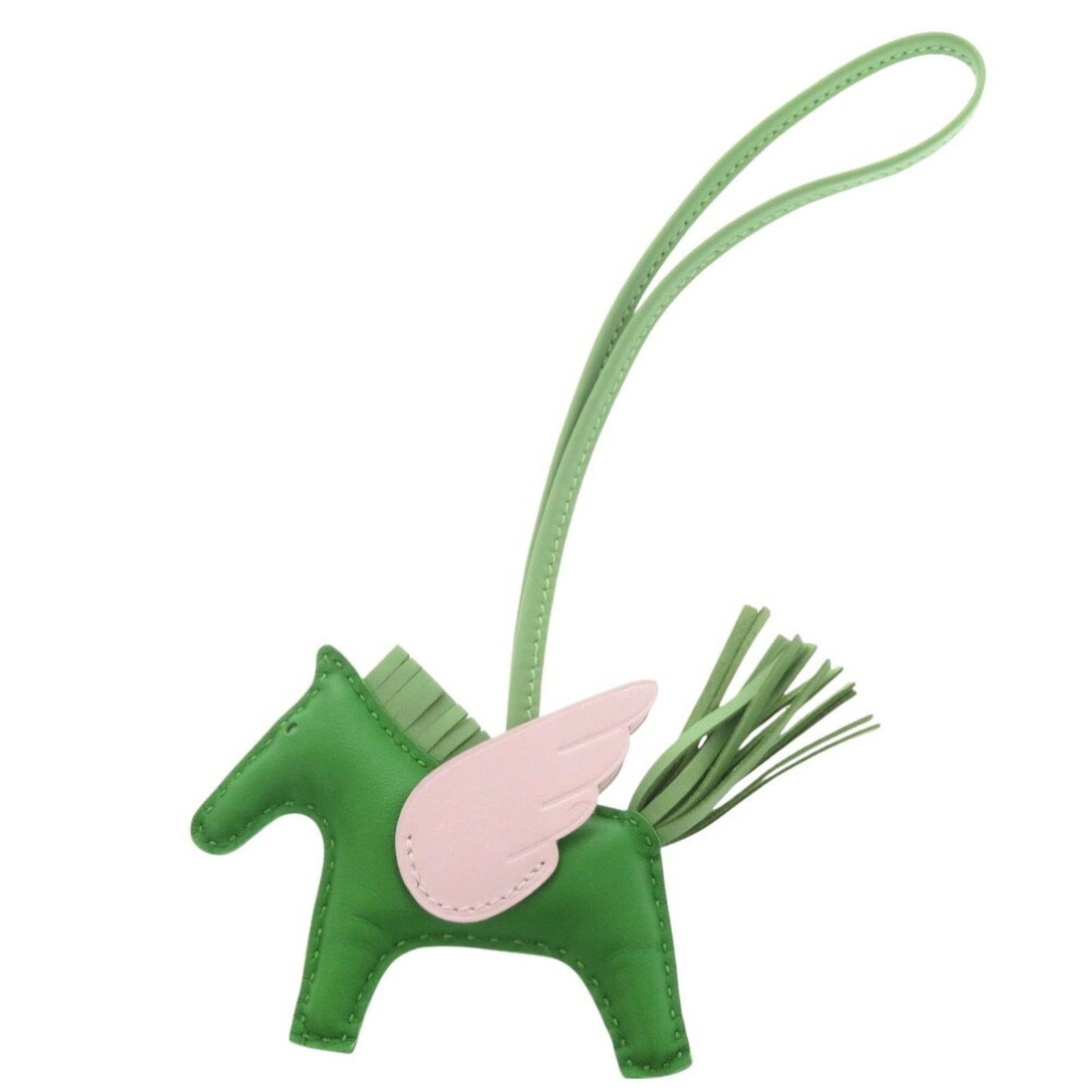 Hermes Handbag Charm Agneau Milo, Swift Leather: Hermes Handbag Charm Agneau Milo, Swift Leather A sleek and sophisticated charm from Hermes, crafted from luxurious Agneau Milo and Swift Leather. Measuring 7.50mm x 9.00mm, this petite accessory