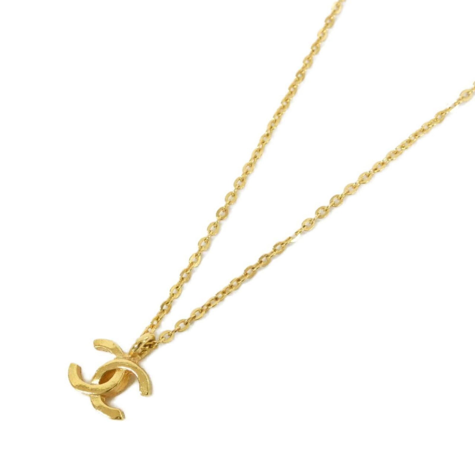 Chanel is a necklace: Chanel is a necklace A stunning Chanel necklace in gold, featuring a 14mm x 13mm pendant, is up for grabs. With its classic design and elegant gold finish, this piece adds a touch of sophistication