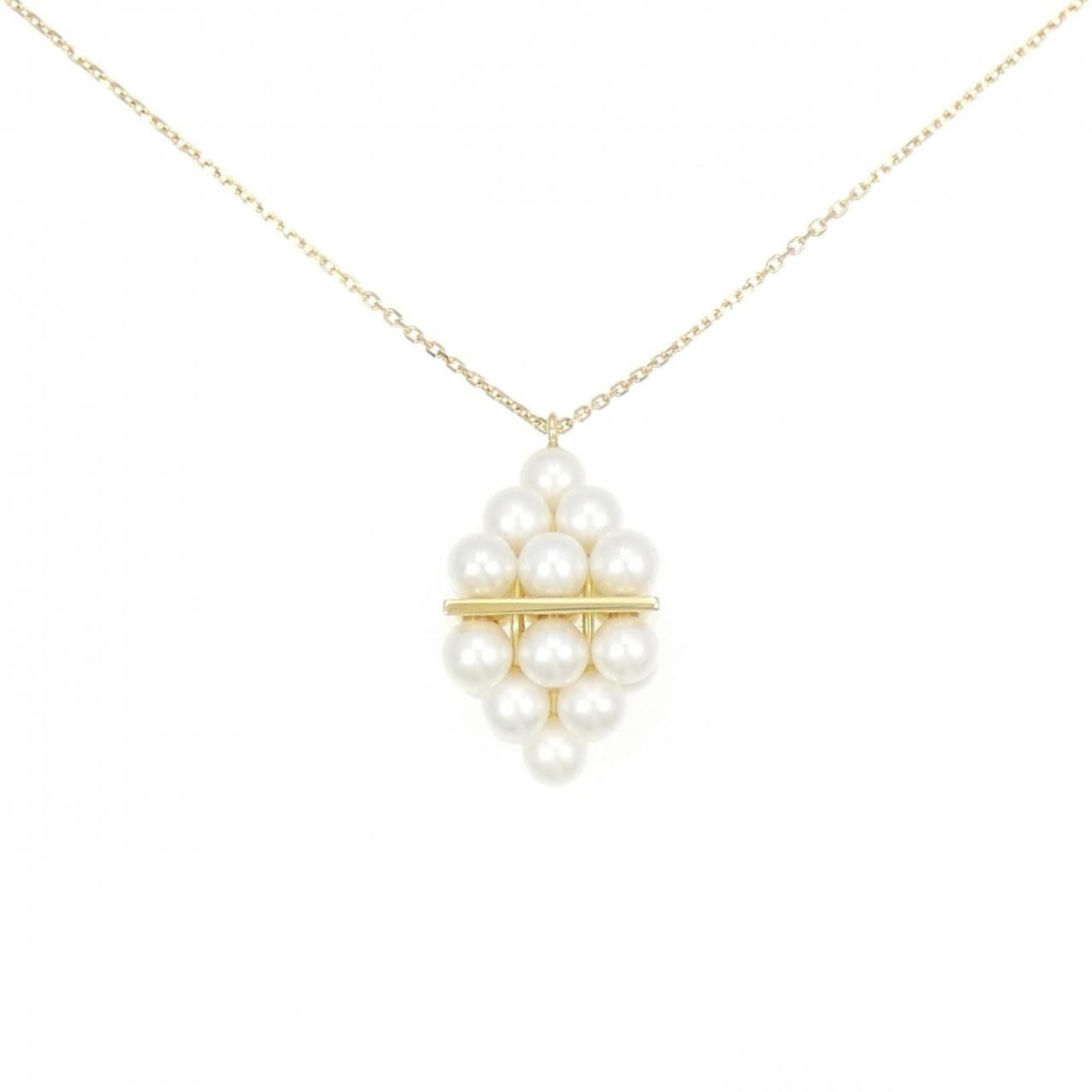 Tasaki pyramid pearl necklace: Tasaki pyramid pearl necklace A delicate 18K yellow gold pendant showcases a beautiful freshwater pearl, carefully crafted into a pyramid shape that adds visual interest to this elegant necklace. The