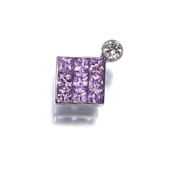 White Gold 750 18K Pink Sapphire Diamond 0.57Ct 0.08Ct Pendant: White Gold 750 18K Pink Sapphire Diamond 0.57Ct 0.08Ct Pendant A stunning 18k white gold pendant showcases a natural pink sapphire surrounded by diamonds, set in a beautiful design that highlights
