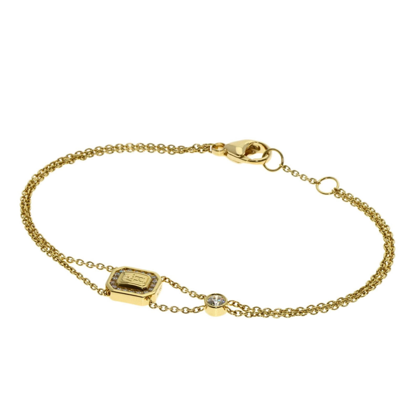 Harry Winston Charm Yellow Gold (18K): Harry Winston Charm Yellow Gold (18K) A delicate charm bracelet from renowned jeweler Harry Winston, this 18K yellow gold piece boasts a subtle elegance with its diamond accent. Measuring 17cm in