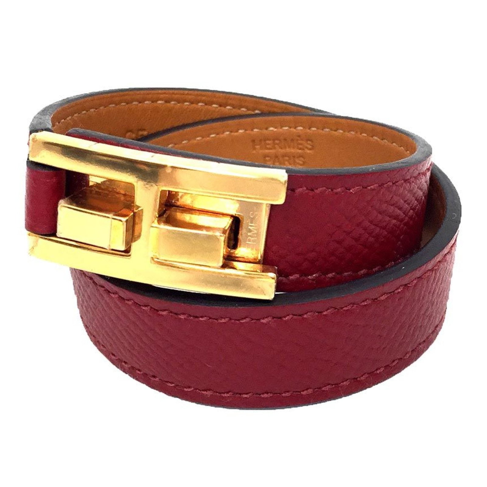 Brass bracelet from Hermes.: Brass bracelet from Hermes. A stunning red brass charm bracelet from renowned luxury brand Hermes, featuring an open design with a total length of 34cm. The bracelet boasts a sleek 1.5cm width and is 