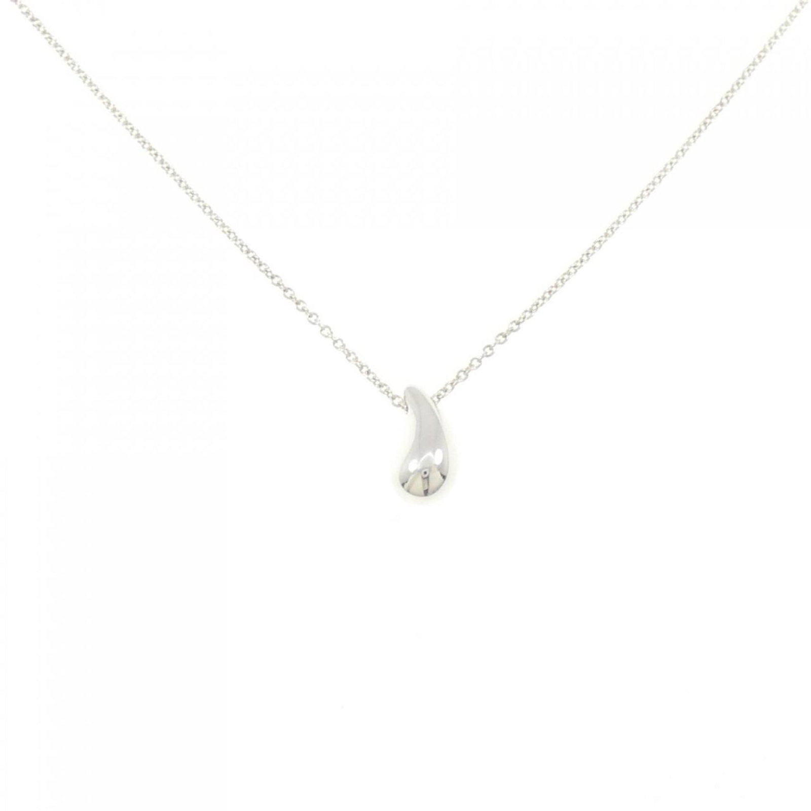 Tiffany teardrop Necklace: Tiffany teardrop Necklace A stunning silver teardrop pendant from Tiffany, this necklace boasts elegant design with intricate details. Made from 925 sterling silver, it adds a touch of sophistication