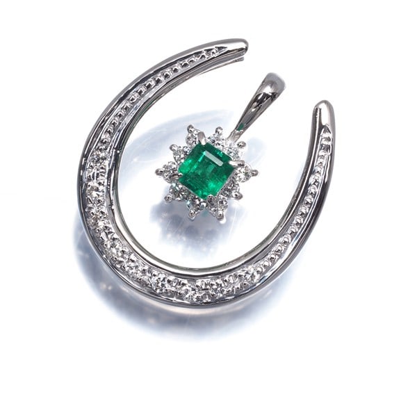 900 Platinum Emerald 0.17Ct 0.24Ct Horseshoe Pendant: 900 Platinum Emerald 0.17Ct 0.24Ct Horseshoe Pendant A stunning 900 platinum emerald pendant shines with natural beauty, its 0.17ct and 0.24ct main stones set in a sleek design that showcases the