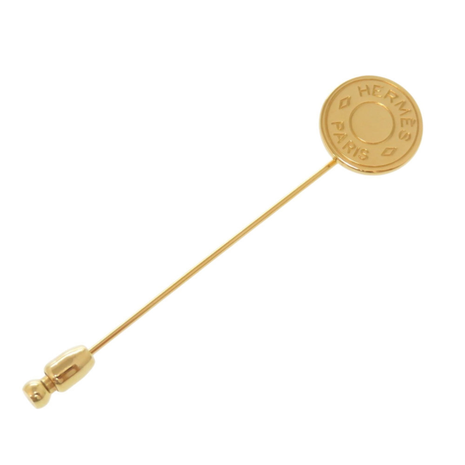 Hermes metal pin brooch.: Hermes metal pin brooch. A luxurious gold ion-plated metal pin brooch from the iconic French fashion house Hermes, featuring a sleek and sophisticated design that adds a touch of elegance to any