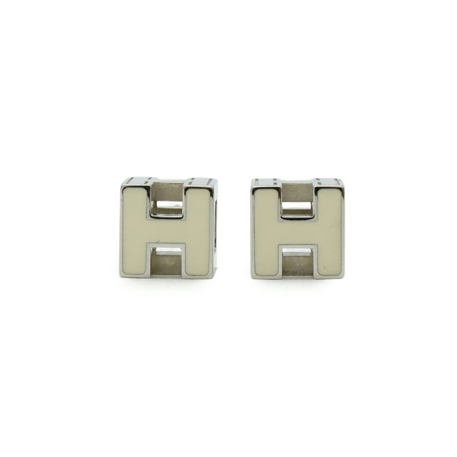 Hermes are stud earrings: Hermes are stud earrings Unique Hermes stud earrings in ivory and silver, featuring a classic design with clean lines. With a small size of 7mm x 7mm x 7mm, these earrings are understated yet