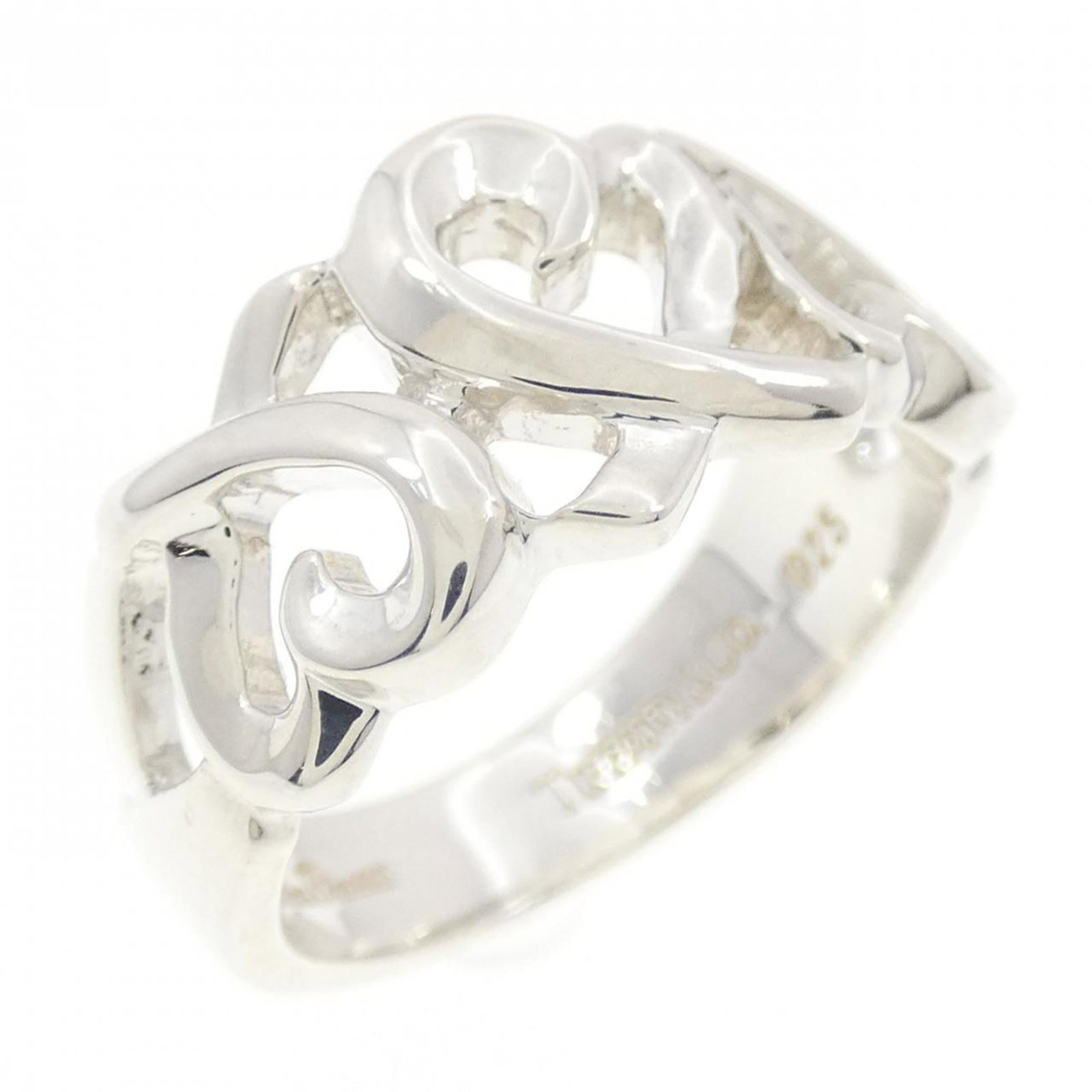 Tiffany silver ring band.: Tiffany silver ring band. A Tiffany silver ring band with a sleek 9.2mm width, this elegant piece is crafted from high-quality 925 sterling silver. With its classic design and understated