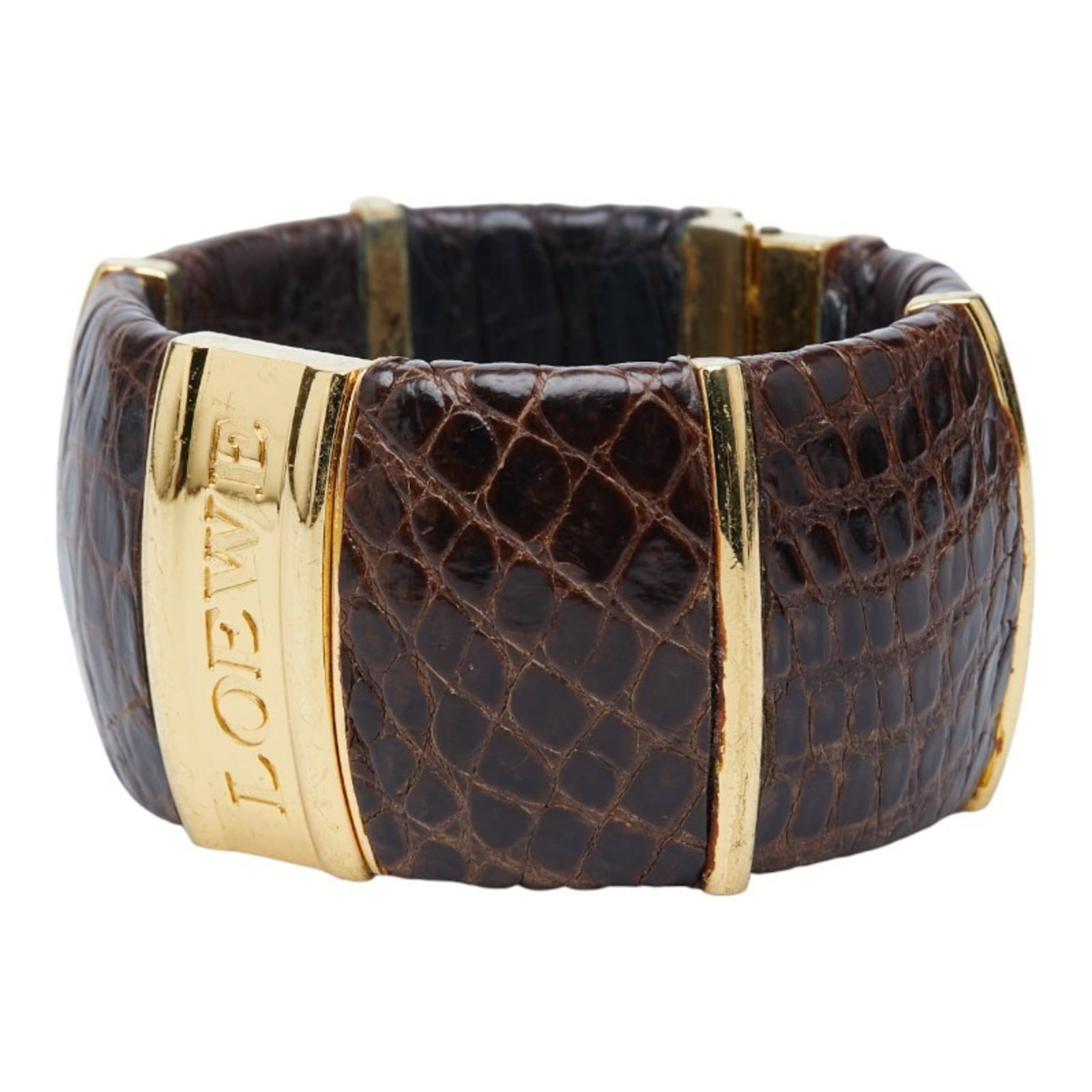 Loewe Bangle Gold Plating, Leather: Loewe Bangle Gold Plating, Leather A luxurious Loewe bangle in gold plating and brown leather, this 16cm long piece boasts a sleek, sophisticated design that adds a touch of elegance to any outfit.