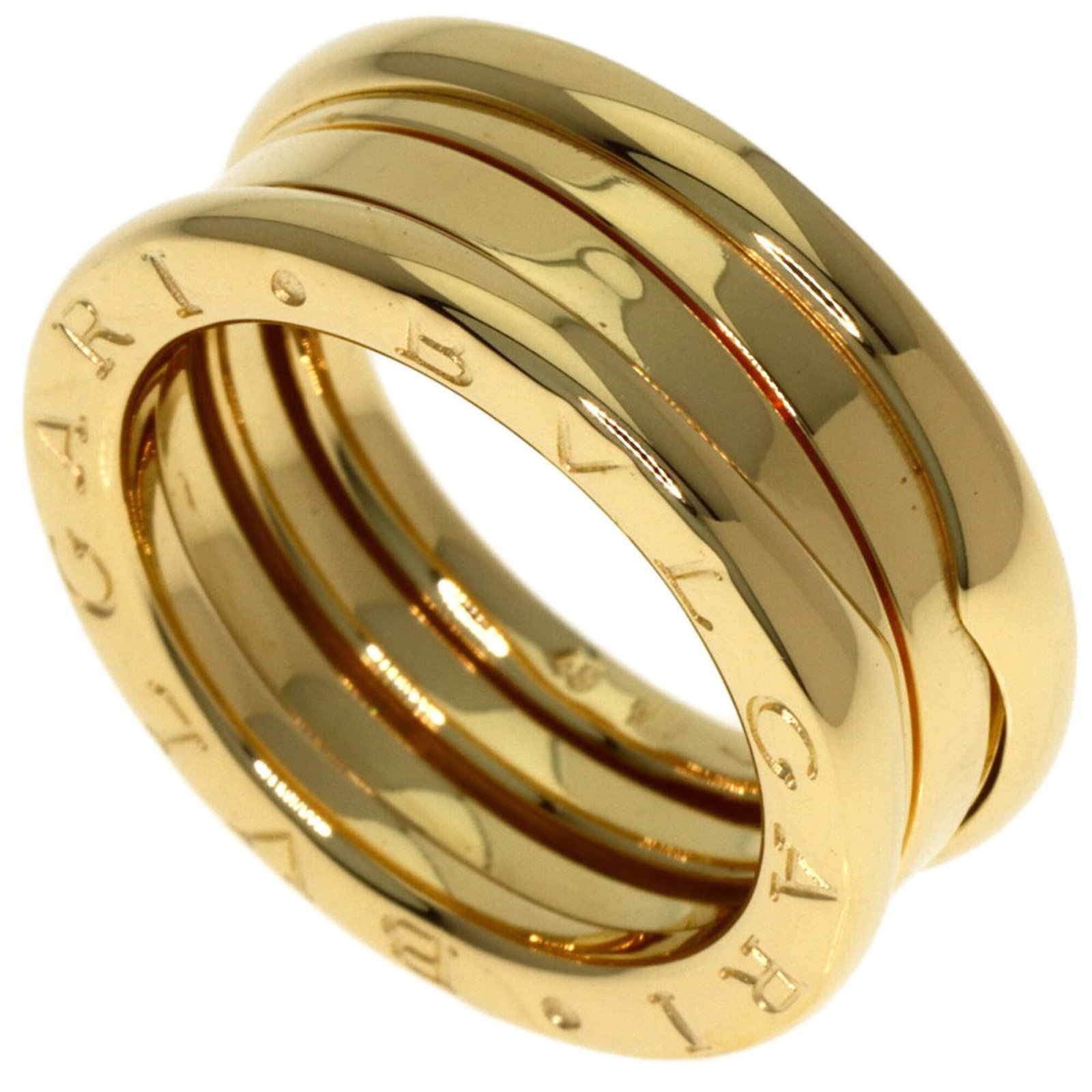 Bvlgari gold yellow band ring: Bvlgari gold yellow band ring A 18K yellow gold Bvlgari band ring with a touch of elegance, this piece boasts a subtle shine from its high-karat gold content. With some minor signs of wear, it still