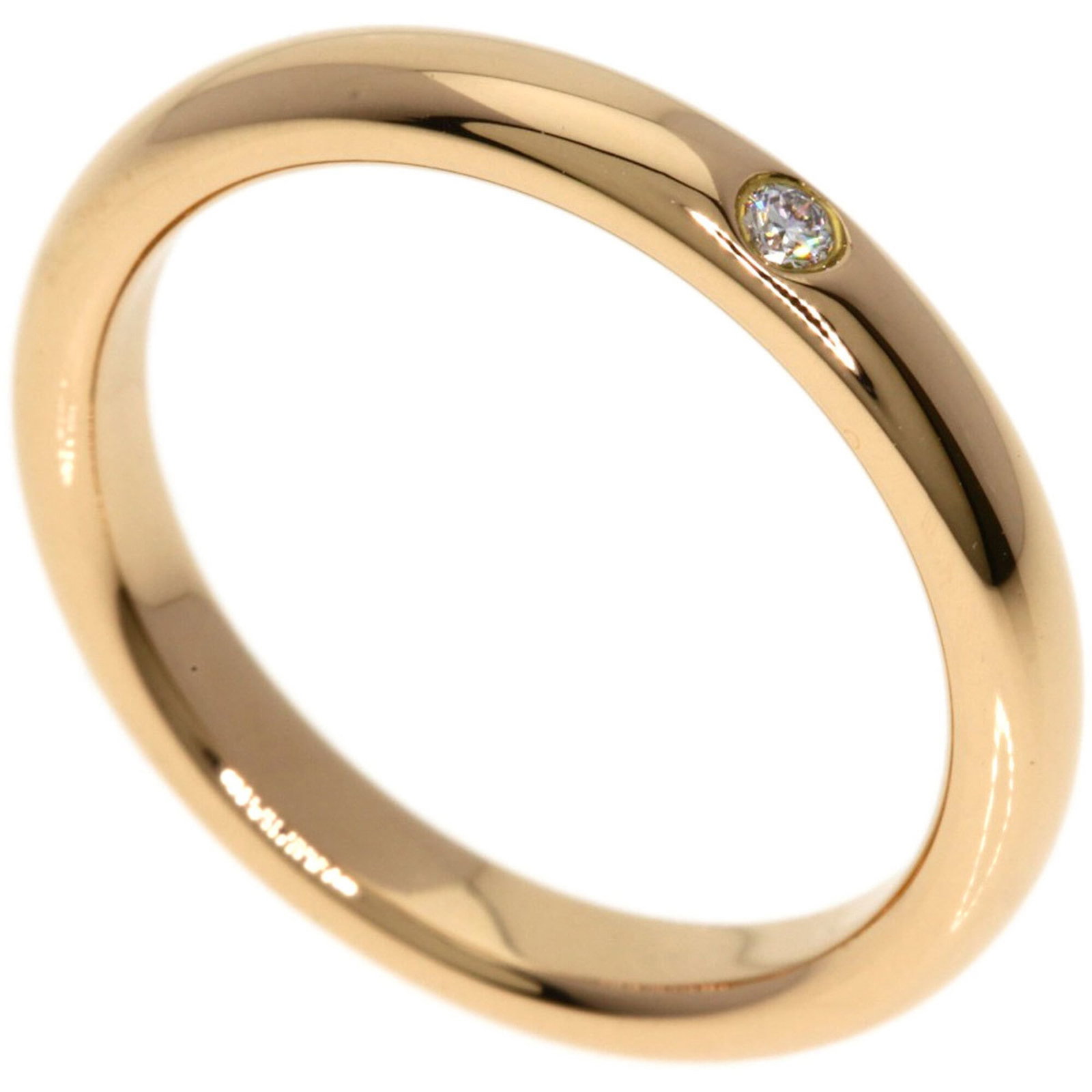 Pink gold 18k Tiffany band ring: Pink gold 18k Tiffany band ring A beautiful 18k pink gold band ring from Tiffany, featuring a sleek design that showcases the subtle beauty of this precious metal. With some minor signs of wear and