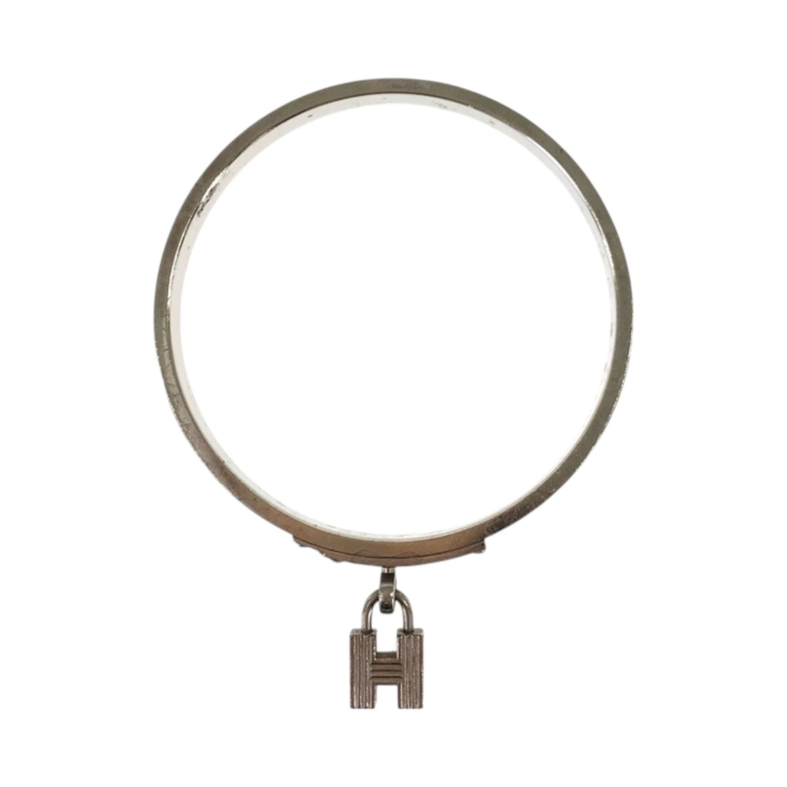 Hermes Leather Metal Charm Bracelet: Hermes Leather Metal Charm Bracelet A gold brown leather and metal charm bracelet from iconic brand Hermes, featuring a 7mm wide strap with a total length of 18.5cm. With its classic design and