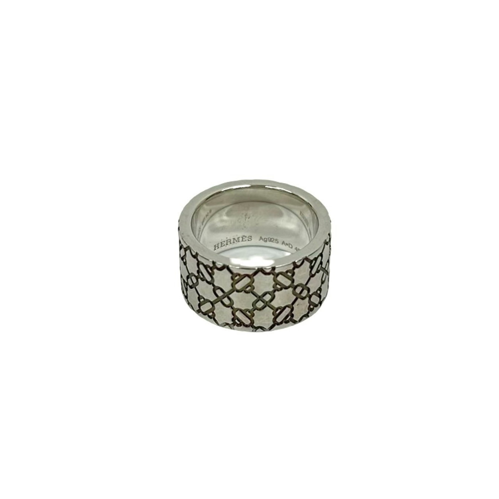 Silver band ring from Hermes.: Silver band ring from Hermes. A sleek and timeless silver band ring from iconic luxury brand Hermes, showcasing the classic style of this renowned fashion house. With its 925 sterling silver material 