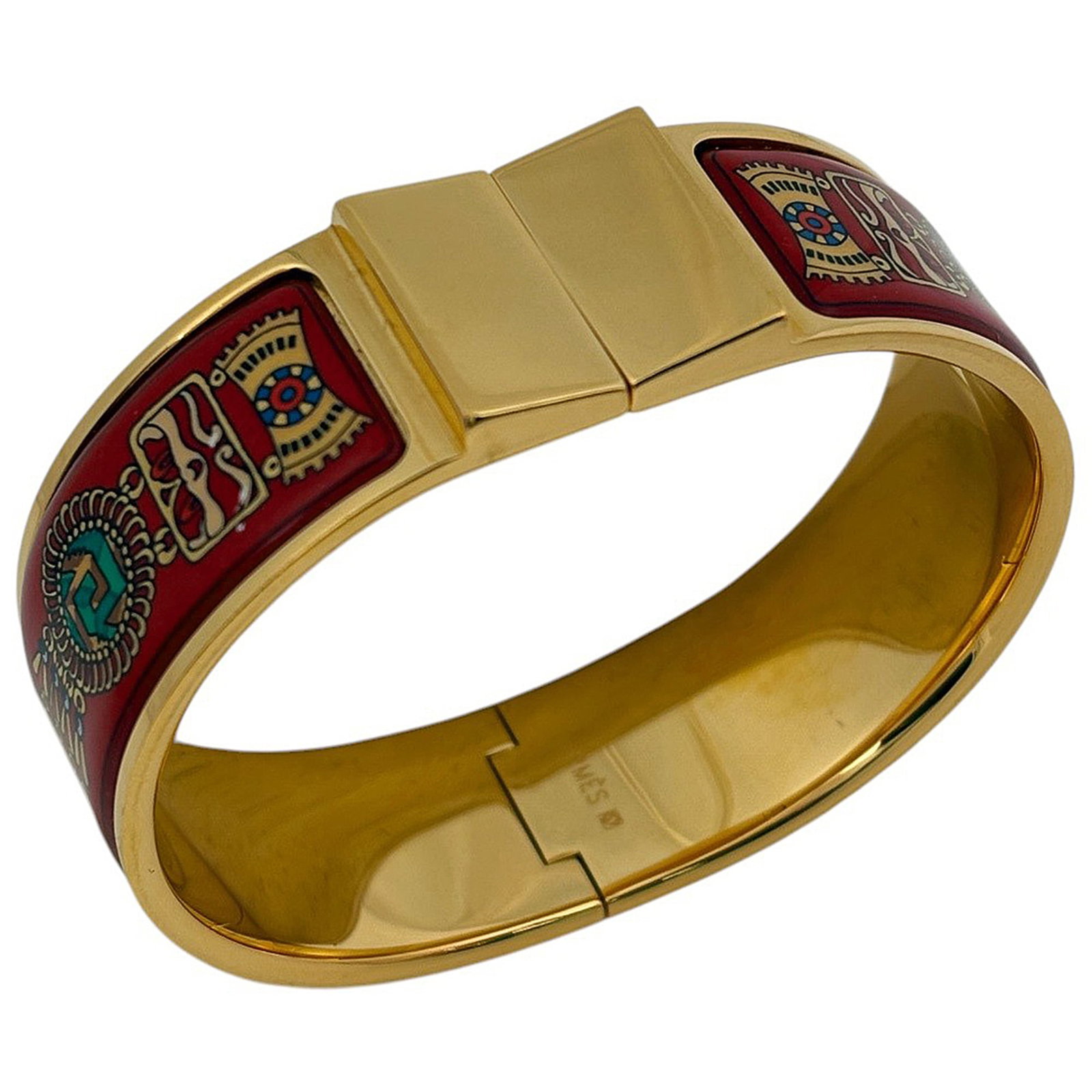 Hermes Bangle: Hermes Bangle A stunning gold bangle from iconic luxury brand Hermes, featuring a sleek 17cm width that adds a touch of sophistication to any outfit. With its rich gold hue and subtle red accents, thi