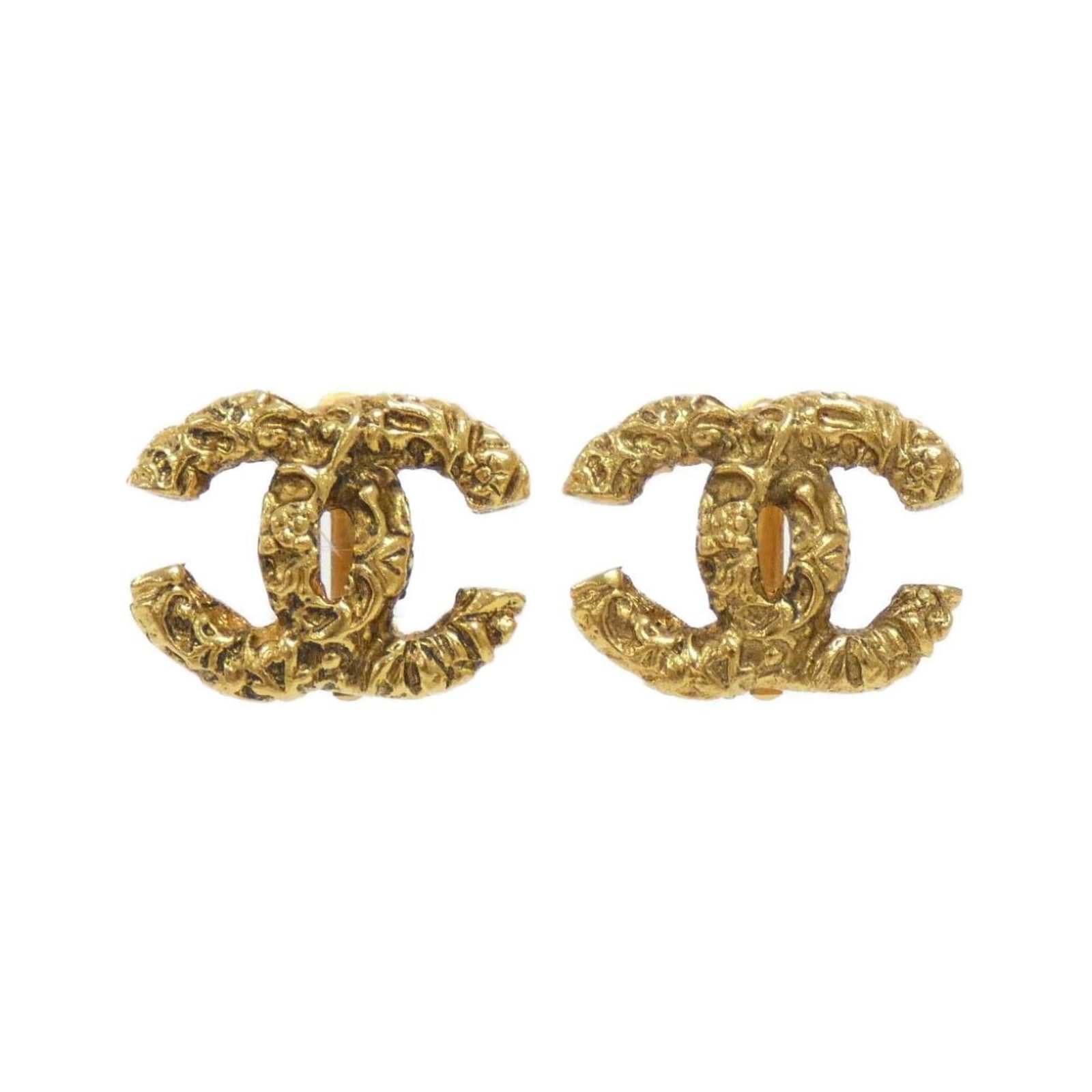 Earrings by Chanel: Earrings by Chanel Elegant gold clip earrings from Chanel, featuring a timeless design that adds sophistication to any outfit. With a few subtle signs of wear, these earrings still shine with their cl