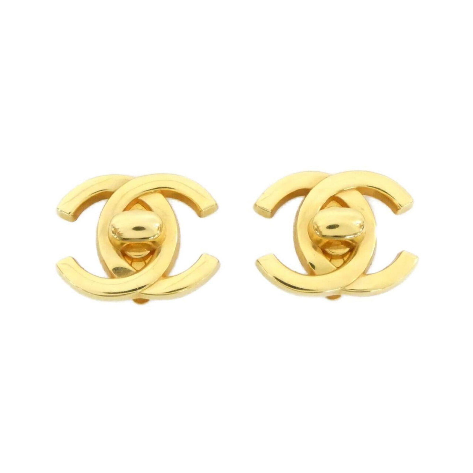 Earrings by Chanel: Earrings by Chanel A pair of elegant clip earrings from Chanel, featuring 24-karat gold details that add a touch of luxury to any outfit. With a subtle size and a few signs of gentle wear, these earri