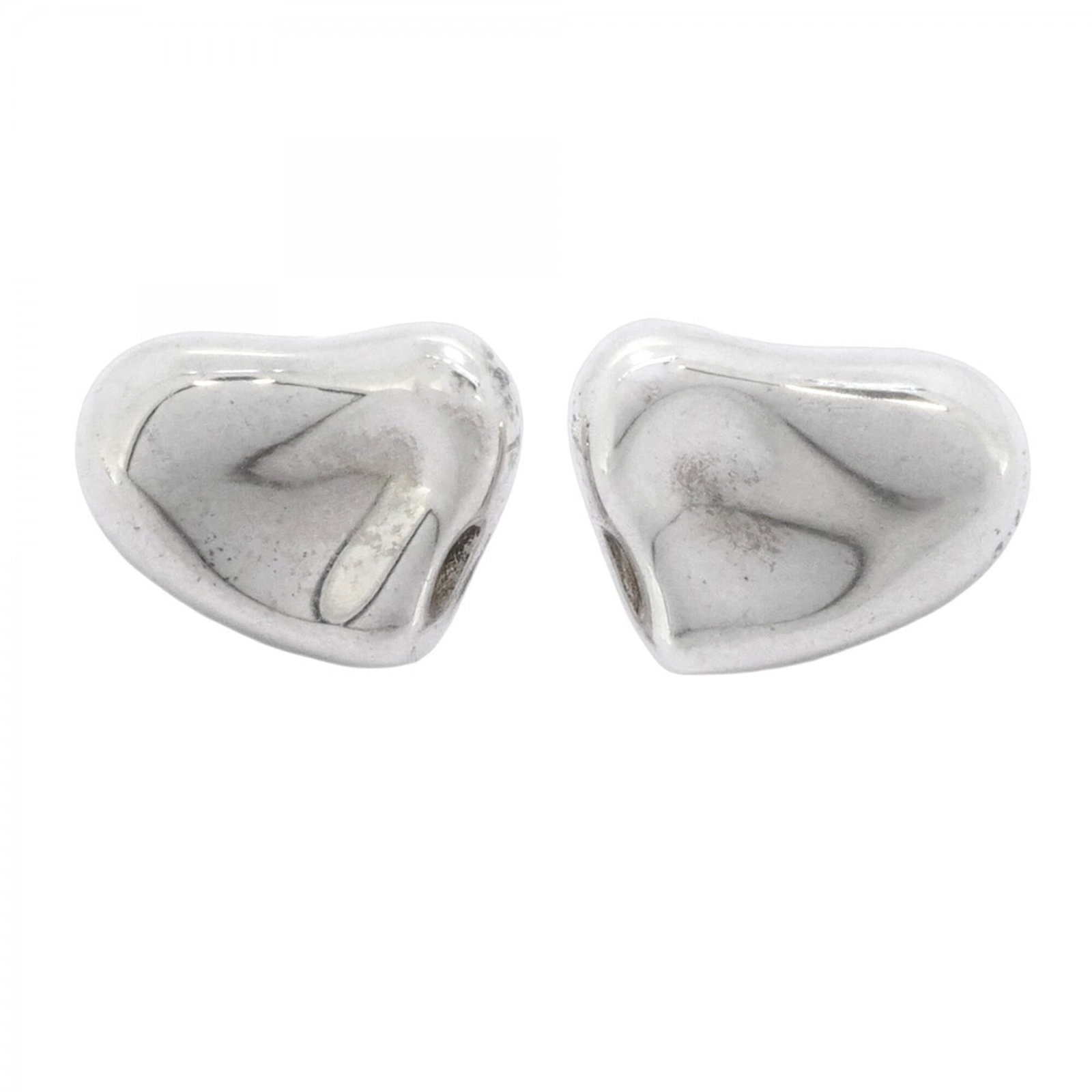 Tiffany Stud Earrings Silver 925: Tiffany Stud Earrings Silver 925 Authentic Tiffany stud earrings in sterling silver 925. With their classic design and durable construction, these earrings have been worn and cared for over time,