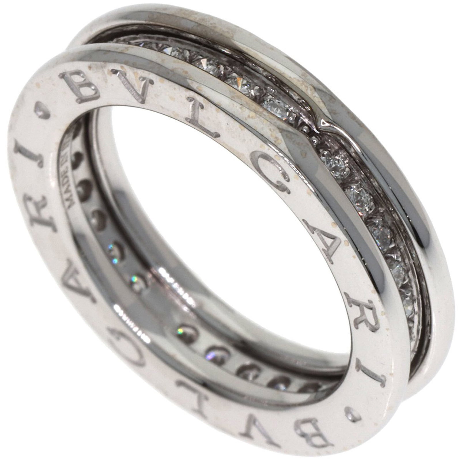 Bvlgari Band Ring White Gold (18K): Bvlgari Band Ring White Gold (18K) A sleek Bvlgari band ring in 18K white gold, this elegant accessory adds a touch of sophistication to any outfit. With its classic design and high-quality