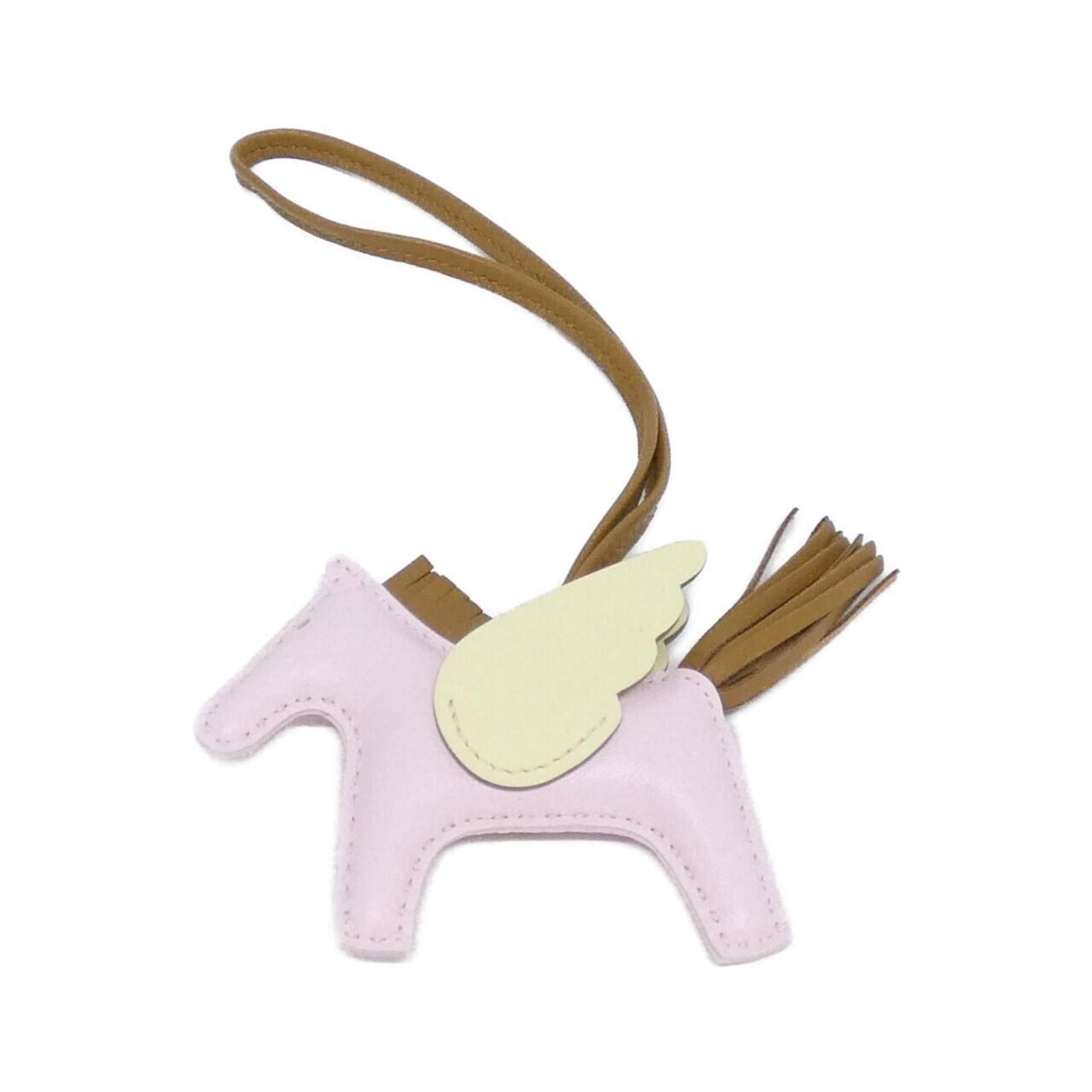 Hermes Handbag Agneau Milo: Hermes Handbag Agneau Milo A unique and stylish accessory for those who appreciate timeless elegance, this Hermes Agneau Milo handbag charm boasts a sleek design in two vibrant colors: Jaune and