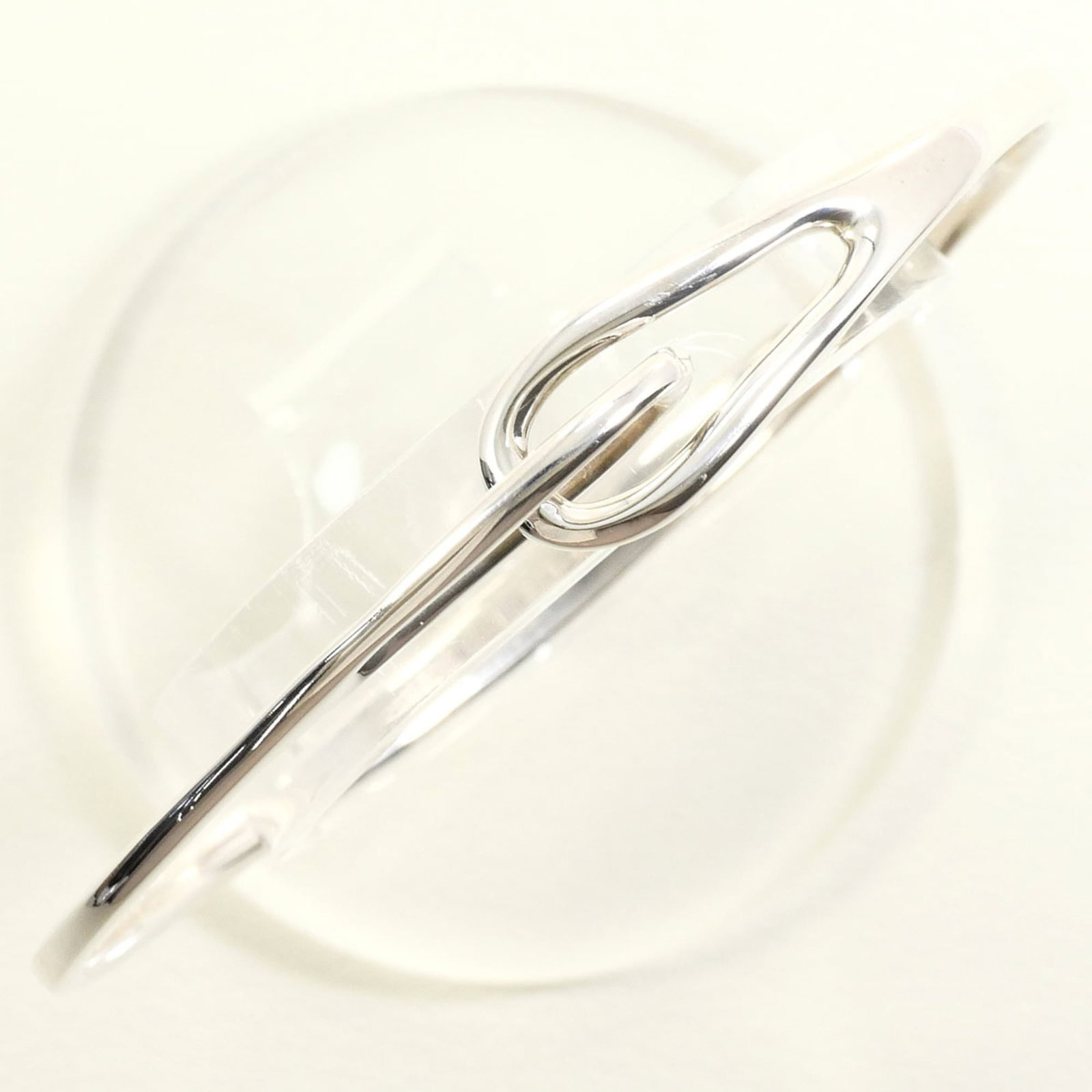 Tiffany silver bangle: Tiffany silver bangle A beautiful Tiffany silver bangle, crafted from 925 sterling silver and measuring 19.5cm in length, adds a touch of elegance to any outfit. With its classic design and