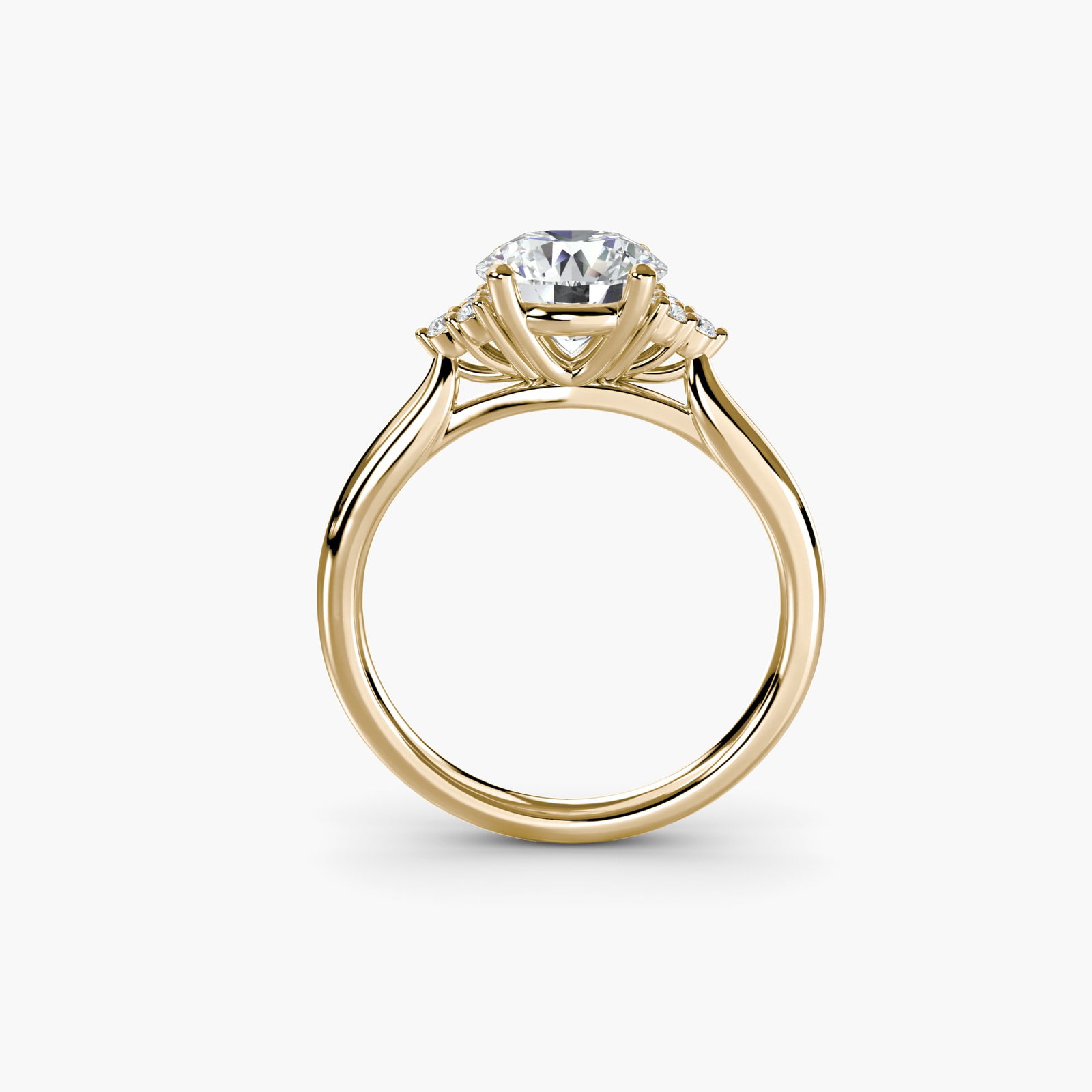 Solitaire Round 14Kt Yellow Gold Ring Setting: Solitaire Round 14Kt Yellow Gold Ring Setting Elegant simplicity is at the heart of this 14Kt yellow gold solitaire round ring setting, featuring six lab-grown side stones totaling 0.078 carats. The