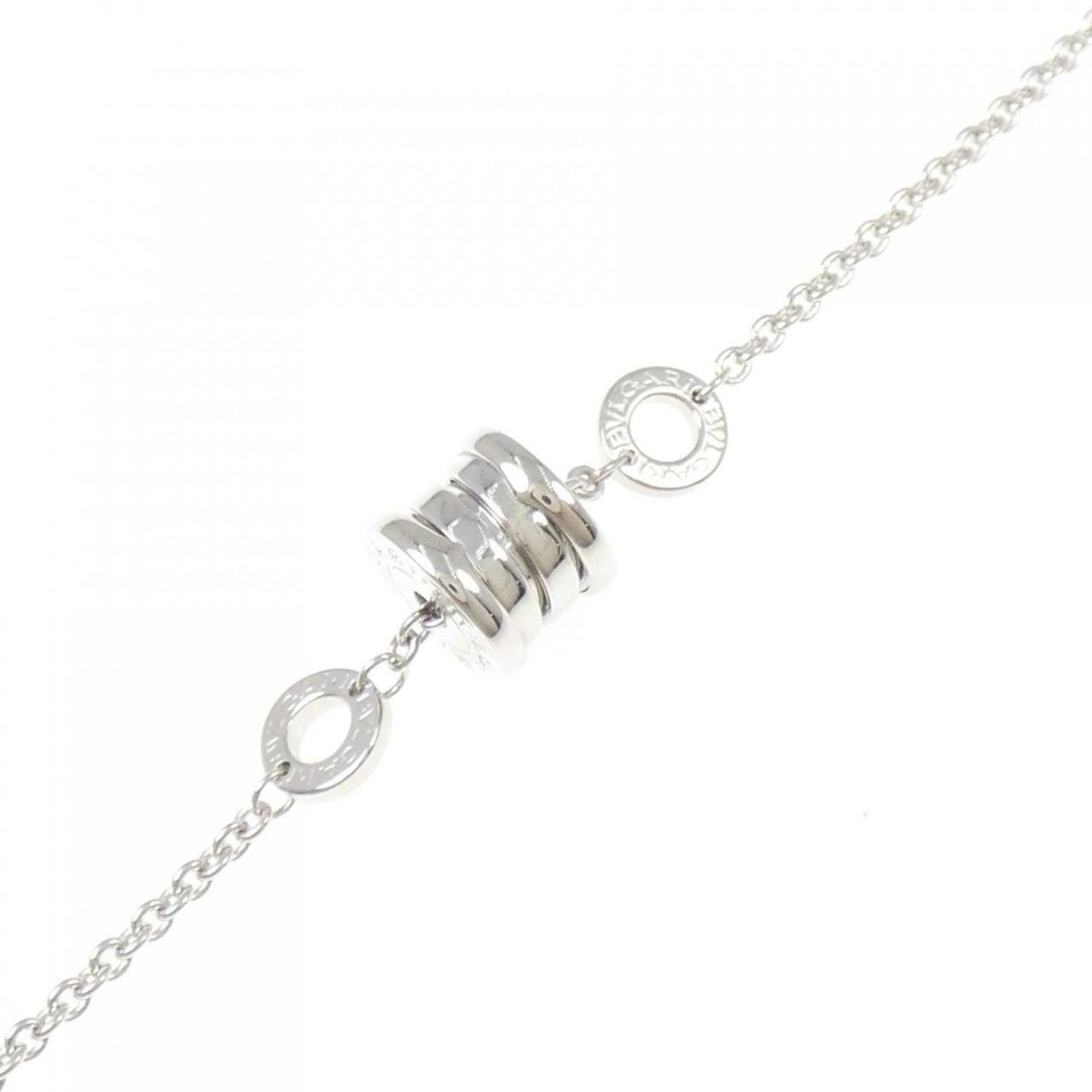 Bvlgari is a white gold charm bracelet.: Bvlgari is a white gold charm bracelet. A sleek and sophisticated white gold charm bracelet from Bvlgari, crafted with 18K purity for a touch of luxury. Measuring 16-18cm in length, this versatile