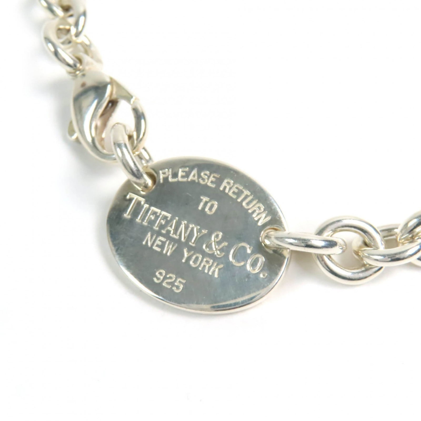 TIFFANY & Co. Return to Tiffany Oval Tag Choker Necklace, 925 Sterling Silver, 52.6g, Men's: TIFFANY & Co. Return to Tiffany Oval Tag Choker Necklace, 925 Sterling Silver, 52.6g, Men's A sleek and sophisticated accessory for the modern man, this Tiffany & Co. Return to Tiffany Oval Tag