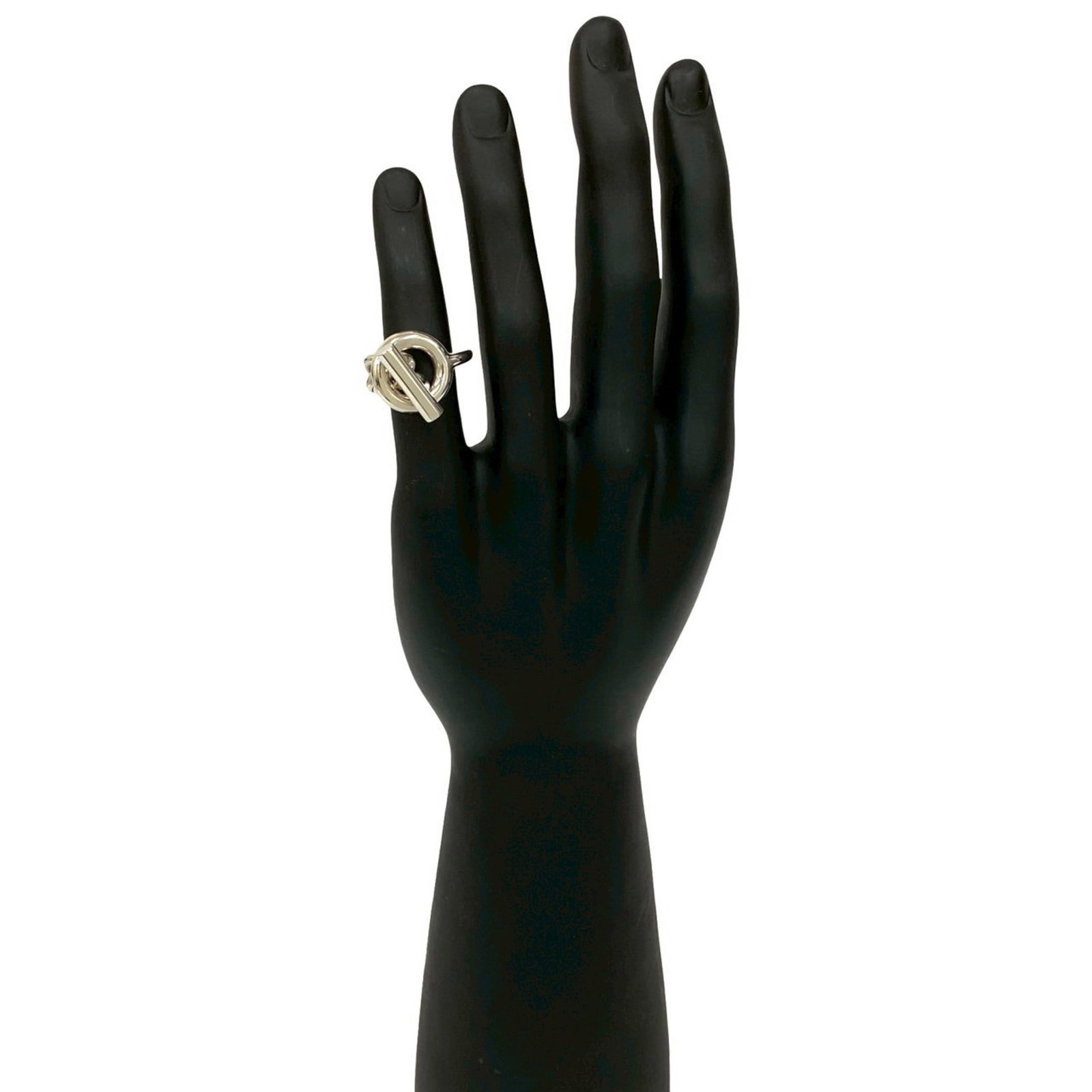 Silver band ring from Hermes.: Silver band ring from Hermes. A silver band ring from iconic luxury brand Hermes, this 925 sterling silver piece boasts understated elegance with its sleek design. With signs of gentle wear, it