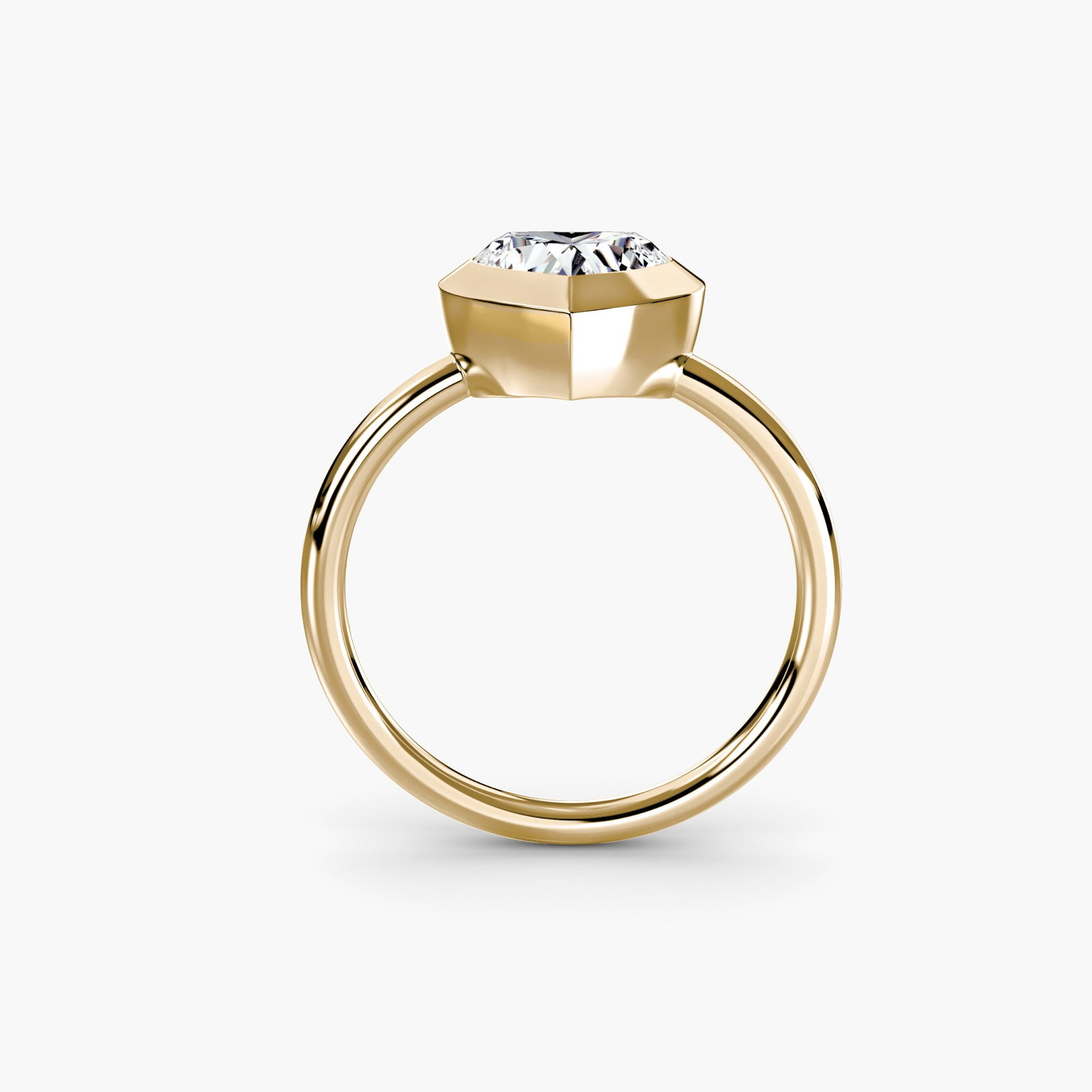 Solitaire Heart 18Kt Yellow Gold Ring Setting: Solitaire Heart 18Kt Yellow Gold Ring Setting Elegant and understated, this 18Kt yellow gold heart-shaped ring setting is a beautiful foundation for your own unique diamond design. With its slender pr