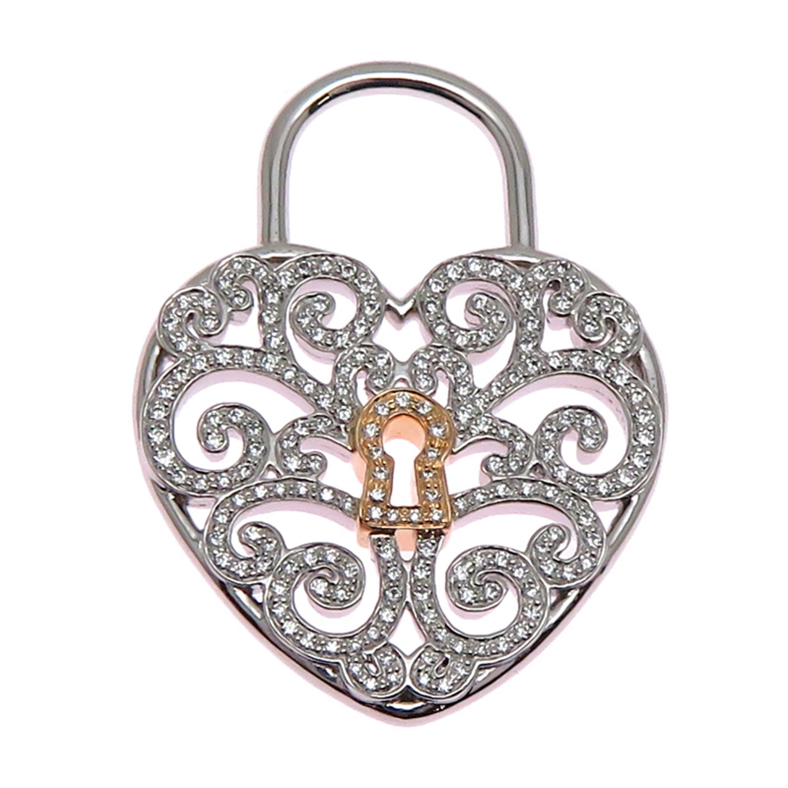 Tiffany Enchant Heart Women's Pendant Top Pt950 Platinum: Tiffany Enchant Heart Women's Pendant Top Pt950 Platinum A stunning Tiffany Enchant Heart pendant shines with 18K pink gold and platinum accents, set with a diamond for a touch of luxury. This