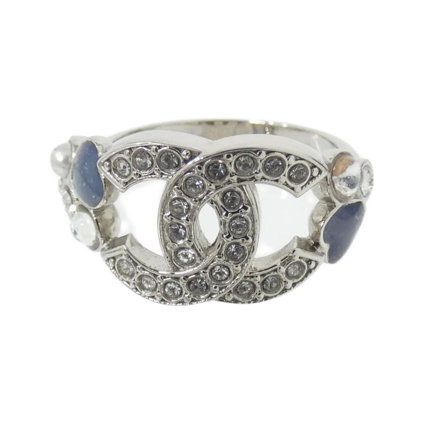Chanel ring band: Chanel ring band A stylish Chanel band ring with a touch of elegance, this blue, pink, and white crystal-studded accessory adds a pop of sophistication to any outfit. With its classic design and