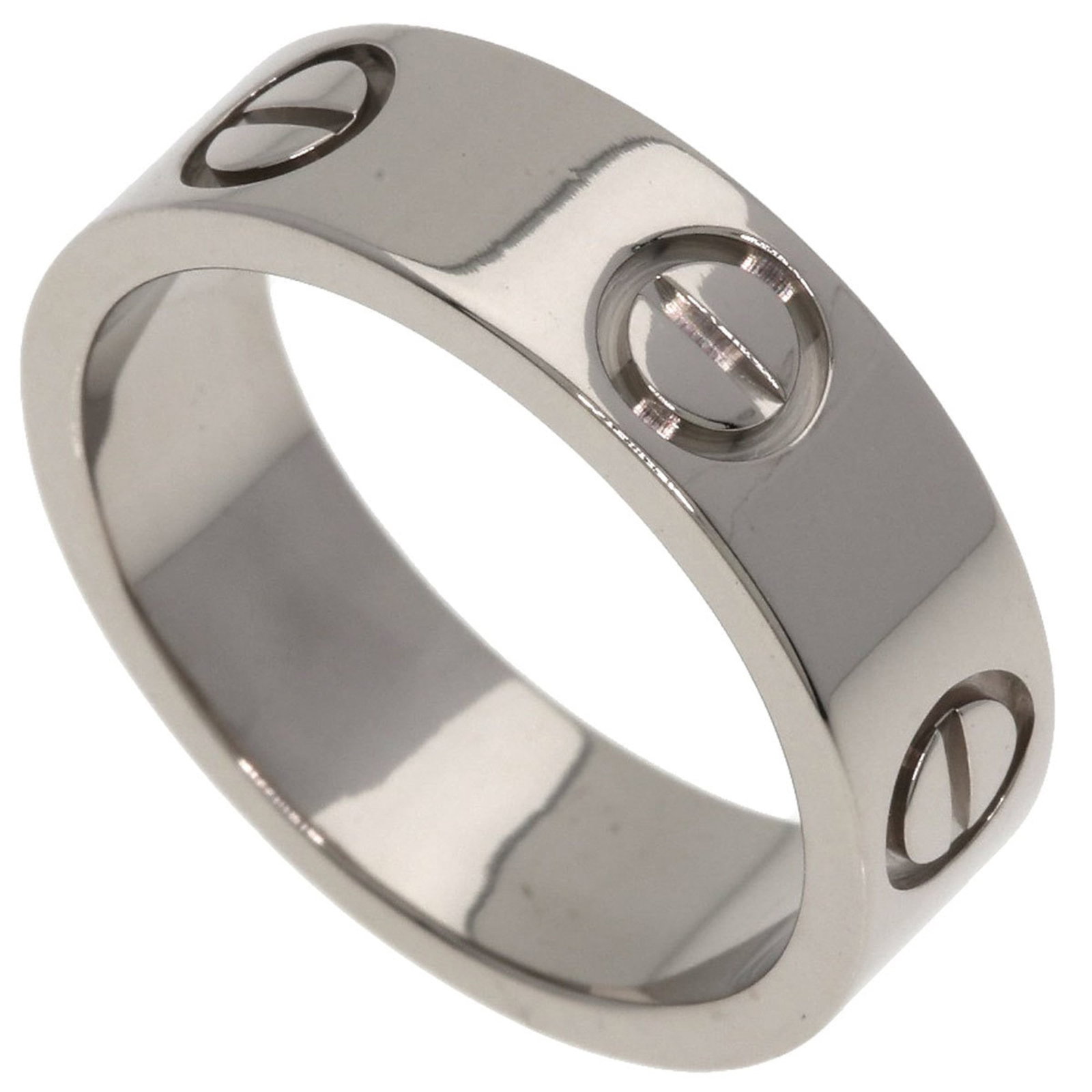 Cartier white gold ring band: Cartier white gold ring band A Cartier white gold ring band with 18K material, this elegant band is available in size 5 and features a few traces of usage, including minor scratches and dirt. Despite