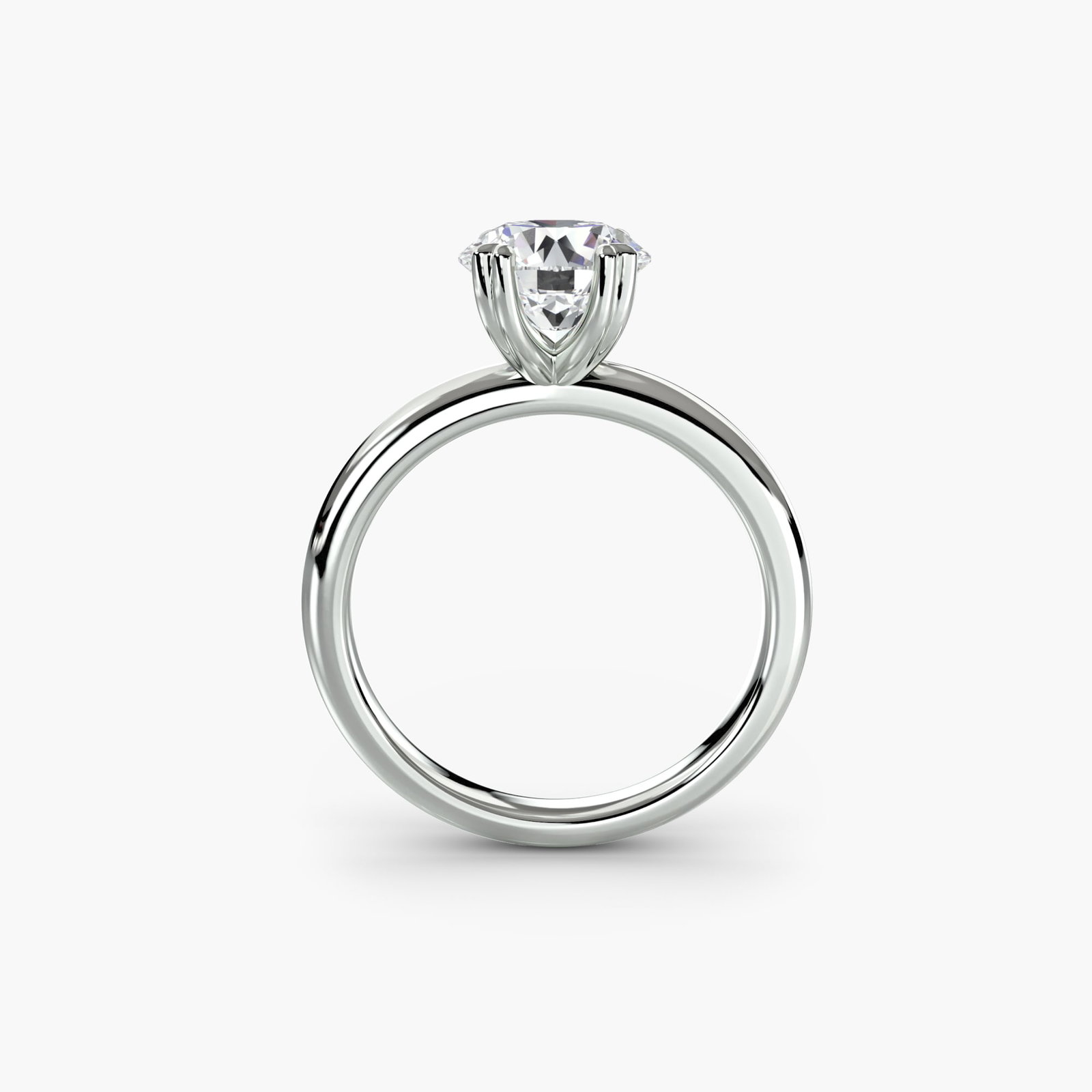 Solitaire Round 18Kt White Gold Ring Setting: Solitaire Round 18Kt White Gold Ring Setting Elegant simplicity is at the heart of this stunning 18Kt white gold solitaire ring setting, featuring a round shape and slender band that adds to its
