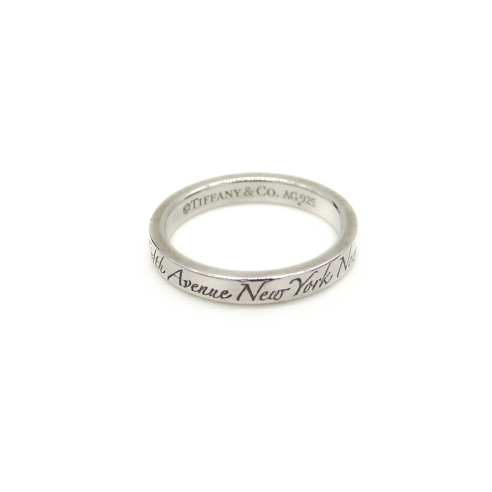 Tiffany silver ring band.: Tiffany silver ring band. A delicate Tiffany silver ring band, crafted from 925 sterling silver, adds a touch of elegance to any outfit with its understated sophistication. This used band showcases