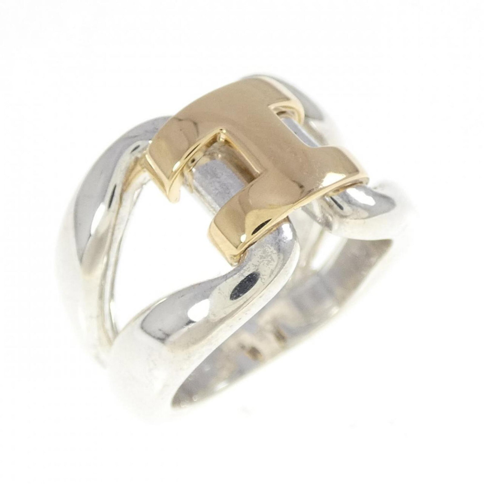 Hermes Band Ring Silver 925, Yellow Gold (18K): Hermes Band Ring Silver 925, Yellow Gold (18K) A sleek and sophisticated silver 925 band ring with a hint of yellow gold (18K) adds a touch of luxury to any outfit. This pre-owned piece boasts a slim 