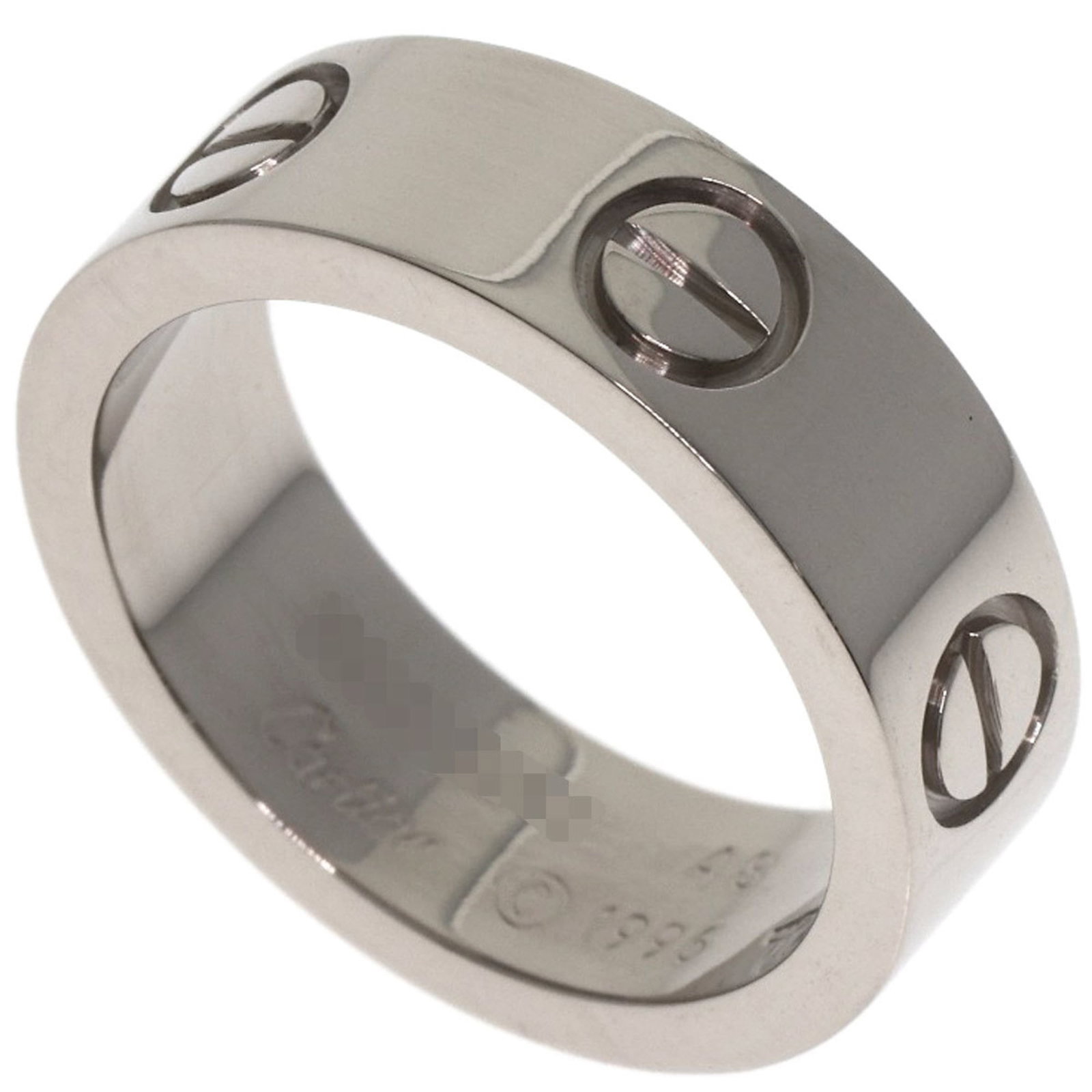 Cartier white gold ring band: Cartier white gold ring band A Cartier white gold ring band, crafted from 18K metal, boasts a sleek design with a width of 5.5mm and a weight of 7.9g. This pre-owned piece features some scratches and