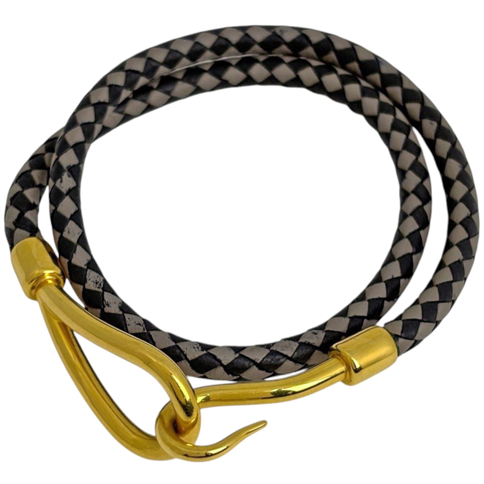 Hermes Charm Leather Bracelet: Hermes Charm Leather Bracelet A sleek and sophisticated accessory for everyday wear, this Hermes Charm Leather Bracelet boasts a timeless design with a subtle black and gray color palette. With its 38