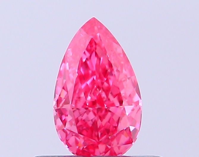IGI Pear 0.38ct Fancy Vivid Pink VVS2 - Loose Lab Diamond: IGI Pear 0.38ct Fancy Vivid Pink VVS2 - Loose Lab Diamond This listing features IGI Pear 0.38ct Fancy Vivid Pink VVS2 - Loose Lab Diamond. Item specifics are provided below. Item Specifics: Source: Th