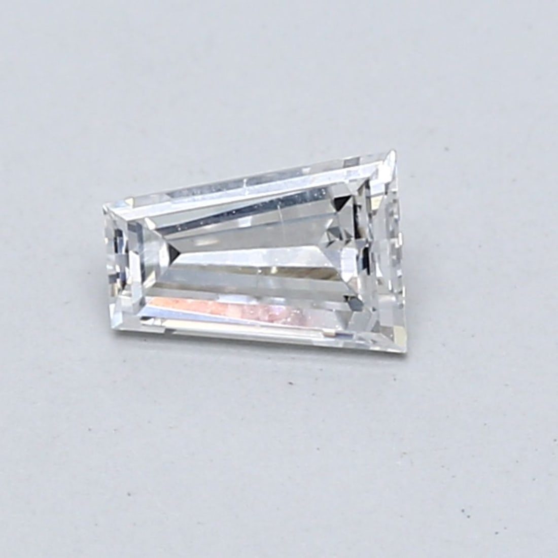 Tapered Baguette 0.4ct E VVS2 - Loose Lab Diamond: Tapered Baguette 0.4ct E VVS2 - Loose Lab Diamond This listing features Tapered Baguette 0.4ct E VVS2 - Loose Lab Diamond. Item specifics are provided below. Item Specifics: Source: This Is A Real Dia