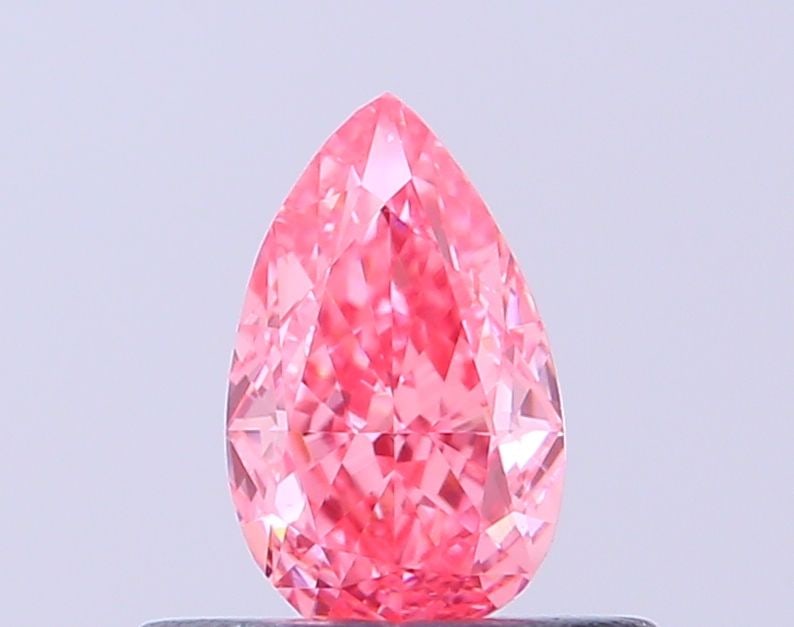 IGI Pear 0.36ct Fancy Vivid Pink VVS2 - Loose Lab Diamond: IGI Pear 0.36ct Fancy Vivid Pink VVS2 - Loose Lab Diamond This listing features IGI Pear 0.36ct Fancy Vivid Pink VVS2 - Loose Lab Diamond. Item specifics are provided below. Item Specifics: Source: Th