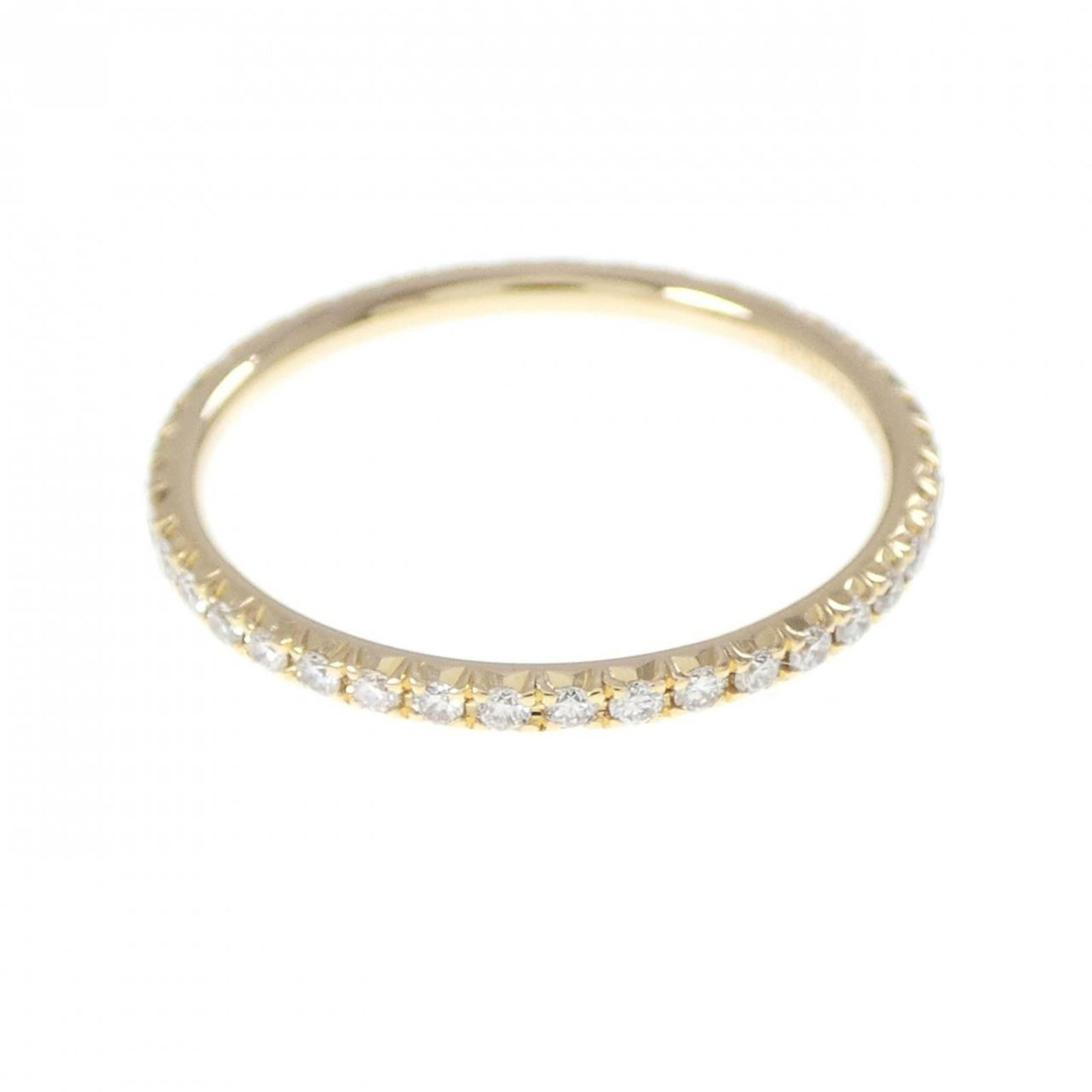 Tiffany Band Ring: Tiffany Band Ring Tiffany's iconic yellow gold band ring boasts an elegant 18K diamond set, showcasing its timeless sophistication. This used, very good condition ring features some minor scratches an