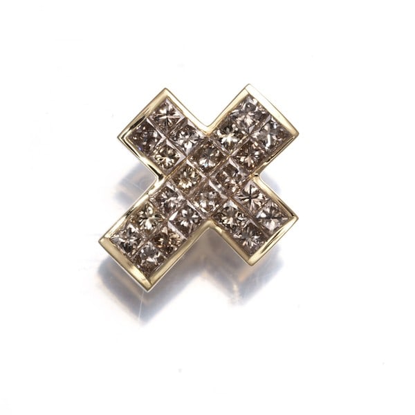 Diamond Cross Pendant in Yellow Gold: Diamond Cross Pendant in Yellow Gold Yellow gold pendant features a natural diamond in an elegant cross design. The metal purity of 18k yellow gold adds to its luxurious feel. A beautiful piece with