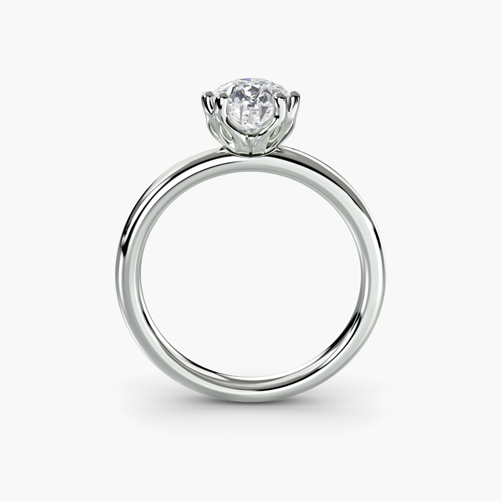 Solitaire Pear 18Kt White Gold Ring Setting: Solitaire Pear 18Kt White Gold Ring Setting The Solitaire Pear 18Kt White Gold Ring Setting is a sleek and elegant design featuring a pear-shaped band with a subtle width of 2. This ring setting showc