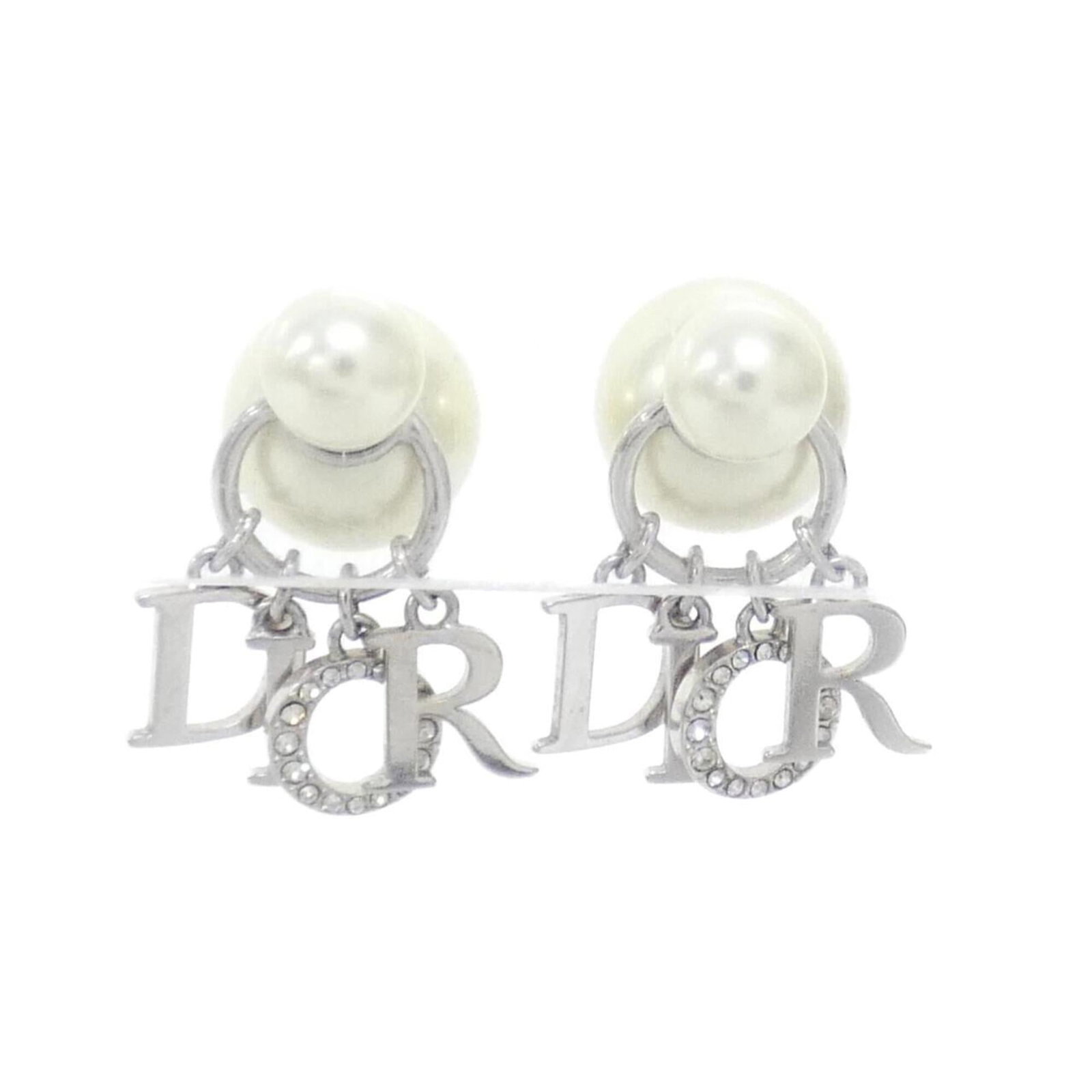 Christian Dior Tribal E1411TRICY Earrings: Christian Dior Tribal E1411TRICY Earrings Silver and white stone Tribal E1411TRICY earrings from Christian Dior feature a unique design with intricate details. The earrings are in very good