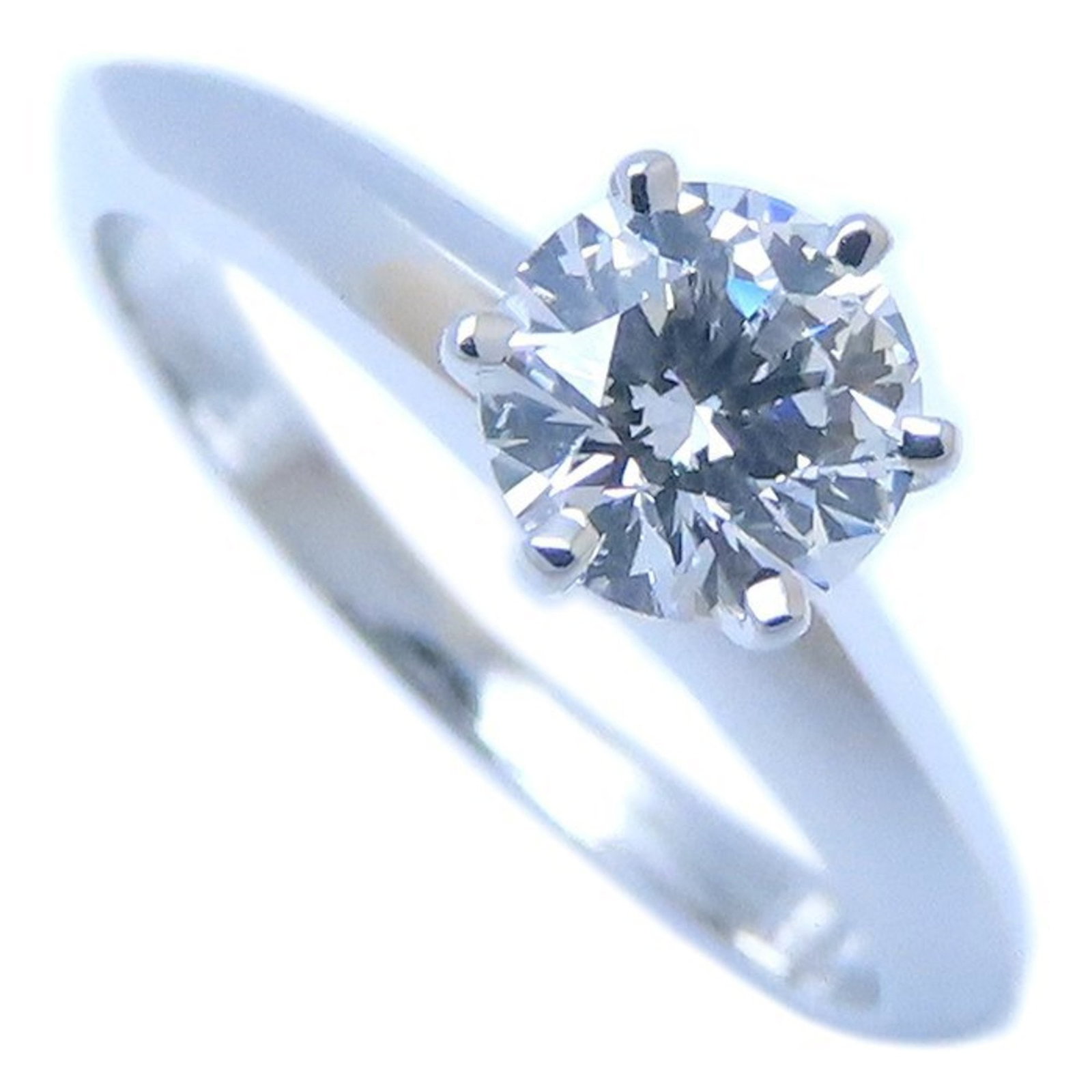 Tiffany Anniversary Ring Platinum 950: Tiffany Anniversary Ring Platinum 950 Platinum 950 construction provides exceptional durability and shine. This Tiffany Anniversary Ring features silver color and a used condition with traces of usage