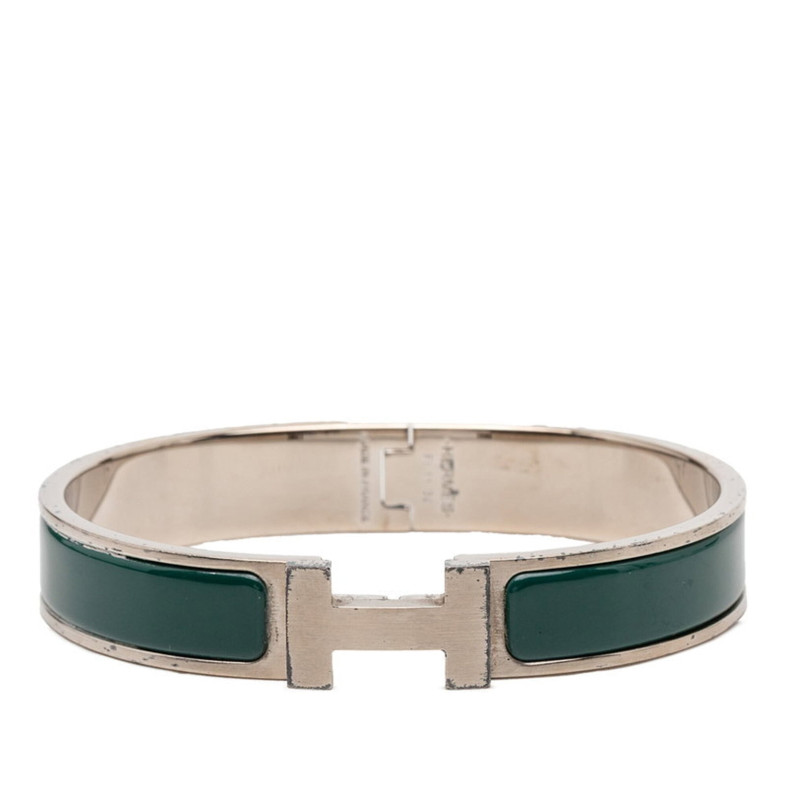 Hermes Charm Bracelet Gold Plating: Hermes Charm Bracelet Gold Plating Gold plating gives this Hermes charm bracelet a touch of luxury. The green and silver tones add visual interest to its 20.5cm length. Traces of usage are evident, wi