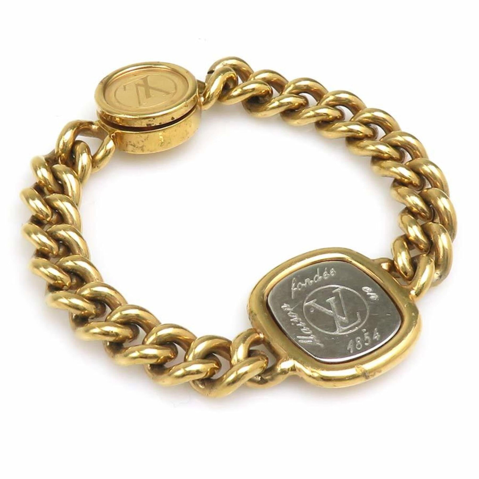Louis Vuitton Charm Bracelet Metal: Louis Vuitton Charm Bracelet Metal This Louis Vuitton charm bracelet features gold and silver metalwork with a classic design. The 17.5cm length provides a versatile fit for everyday wear, while its u