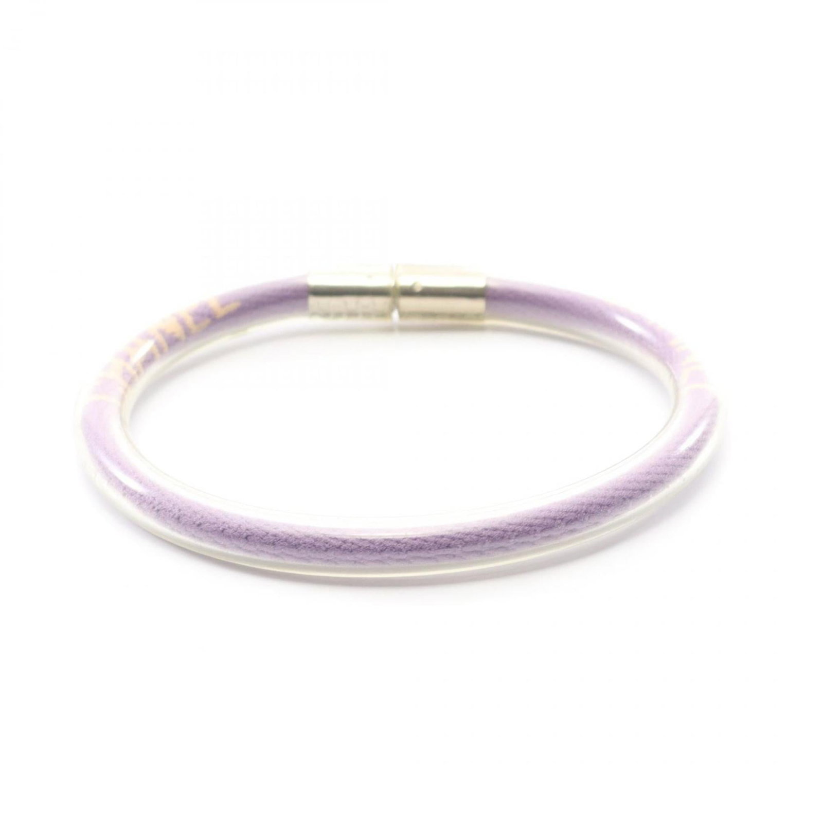 Chanel Charm Bracelet Rubber: Chanel Charm Bracelet Rubber This Chanel Charm Bracelet Rubber features a vibrant purple color and has been worn to show some signs of use, including a few scratches and minor dirt marks. Despite this
