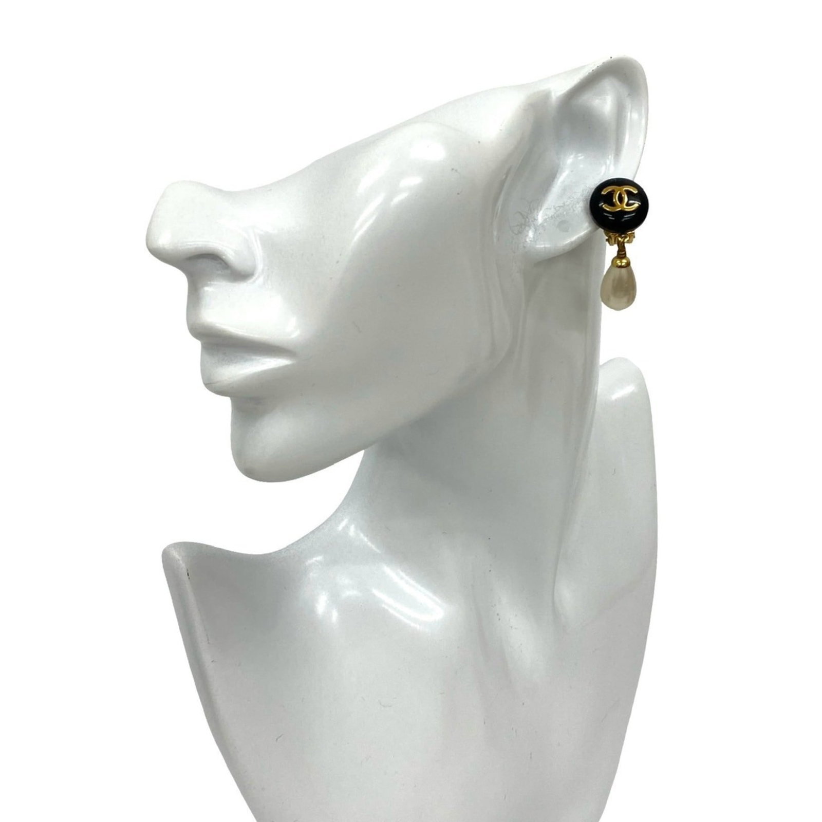 Chanel Clip Earrings Gold Plating: Chanel Clip Earrings Gold Plating Chanel Clip Earrings in Gold Plating are available for purchase. These earrings feature gold plating and come in black, gold, and white colors. They have a clip