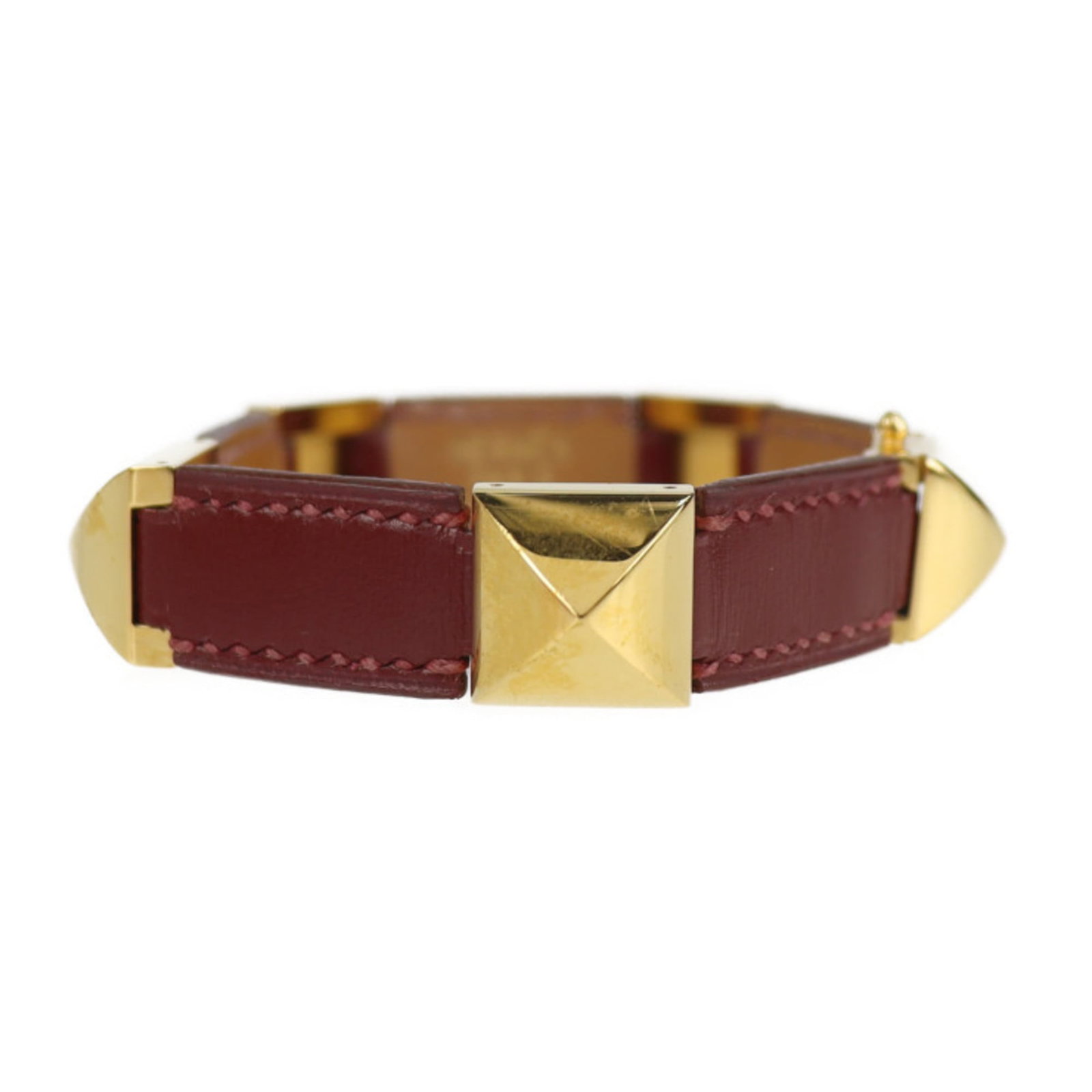 Hermes Charm Bracelet Leather: Hermes Charm Bracelet Leather Red leather charm bracelet from Hermes with a total length of 18.5cm and a width of 9mm, featuring a vintage style and a few traces of usage visible on its surface. The b
