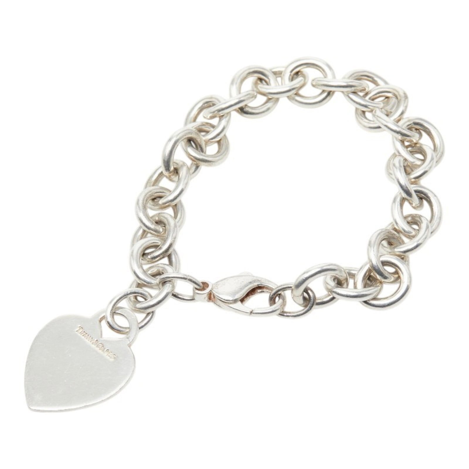 Tiffany Charm Bracelet Silver 925: Tiffany Charm Bracelet Silver 925 Silver 925 Tiffany Charm Bracelet in Good Condition. This used charm bracelet features silver 925 material and has a length of 16.5cm / 6.49''. With traces of usage a